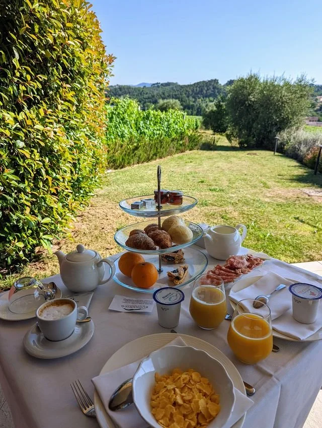 Breakfast overlooking vineyards at Buonamico Wine Resor