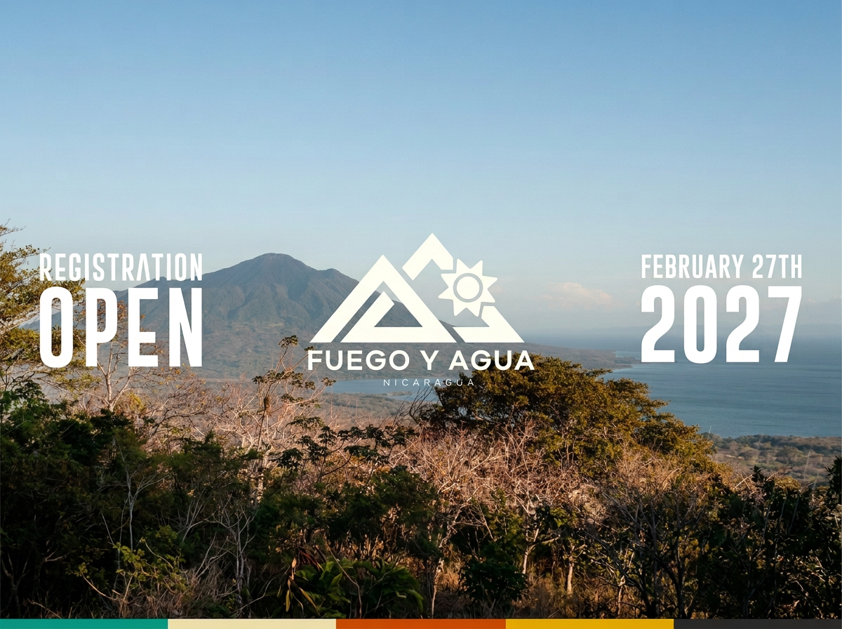Landscape view of a mountain, ocean, and trees with overlaid event information including registration open, date February 27th, 2027, and location Fuego y Agua, Nicaragua.