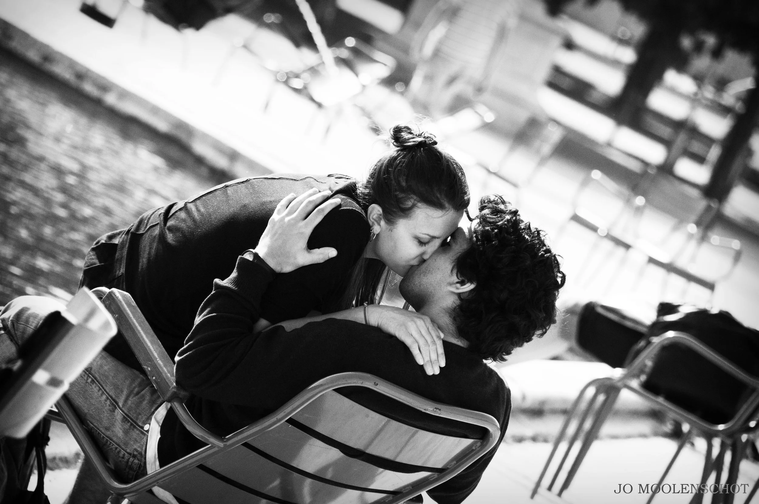 Couple Kissing in Paris street photography.jpg