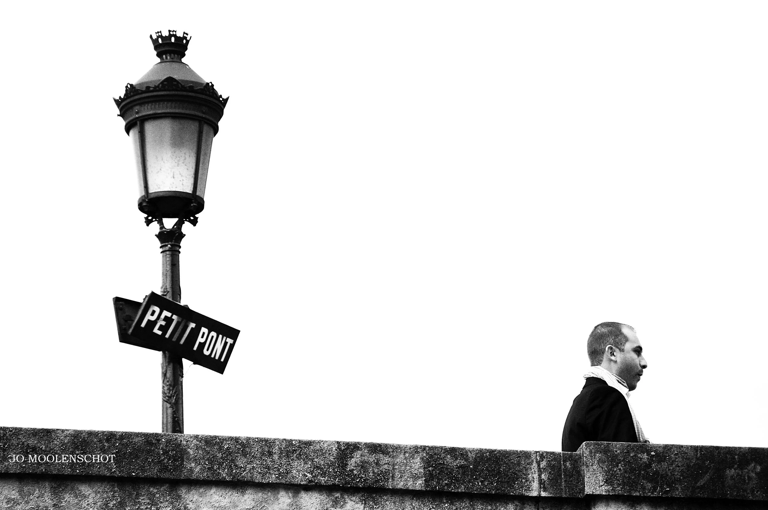 Man on Petit Pont Paris street photographer.jpg