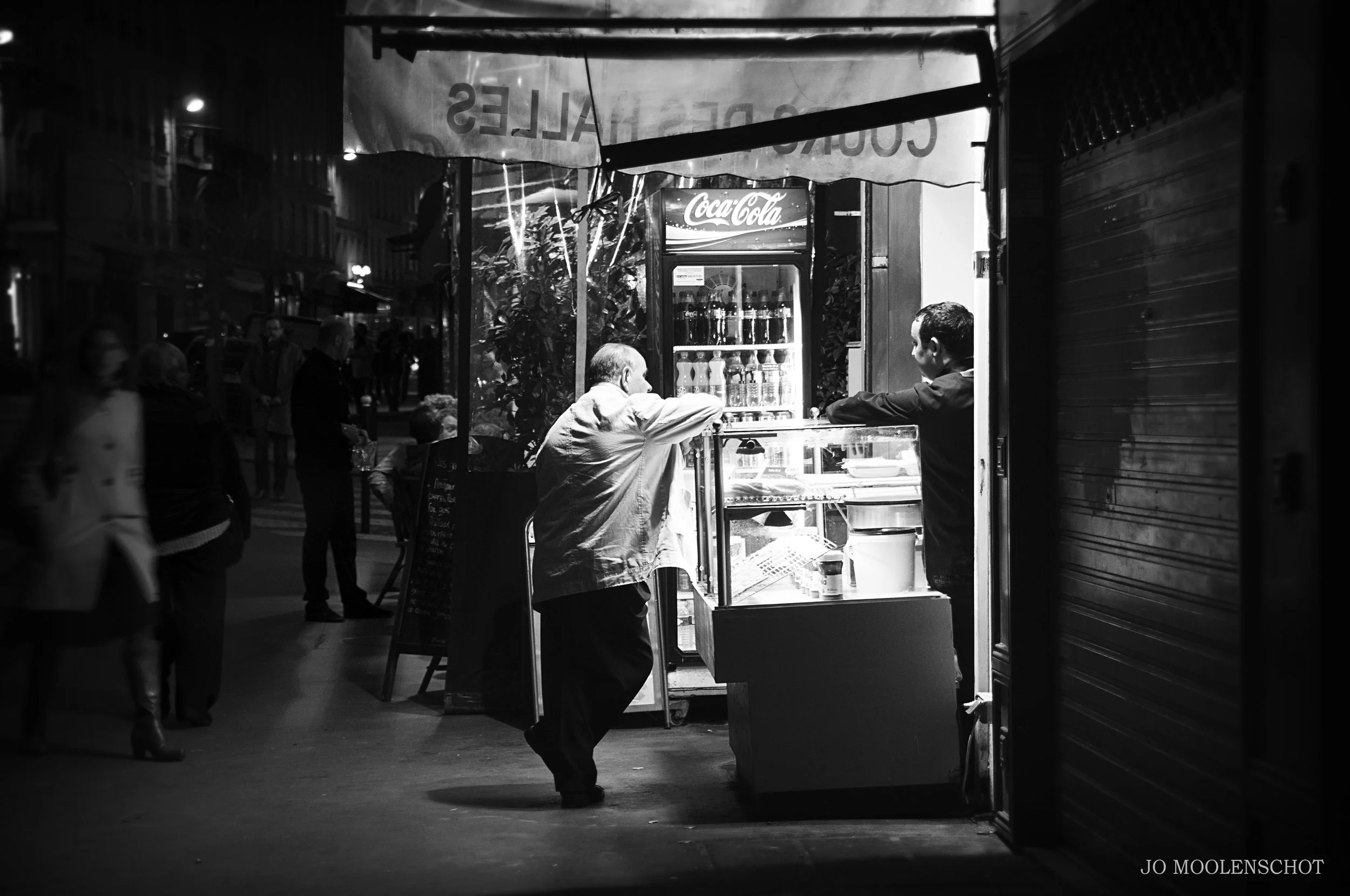 Shop Owners Talking Montmartre Paris Jo Moolenschot.jpg