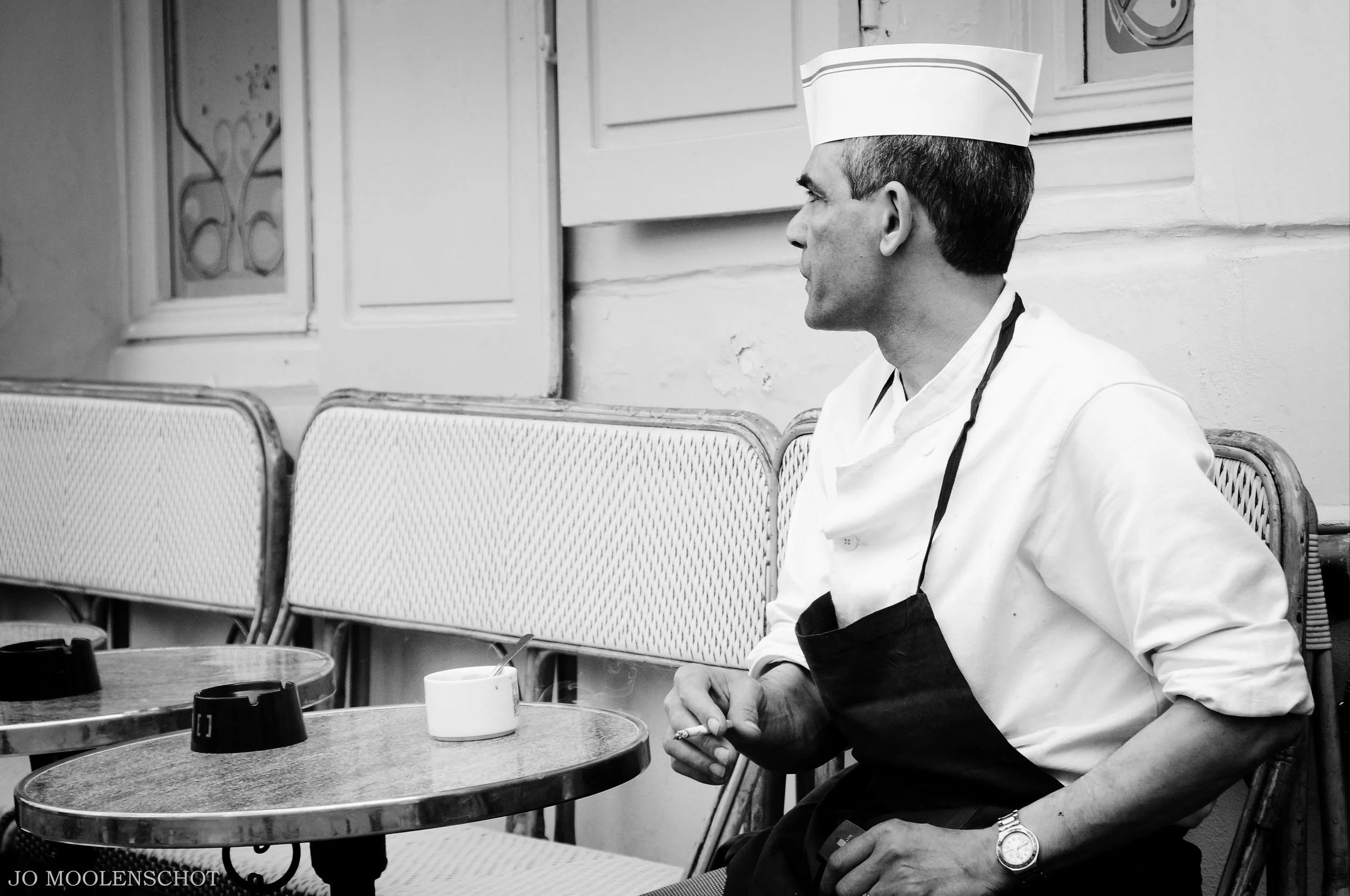 Cigarette Break Paris 18th Arrondissment street photography.jpg
