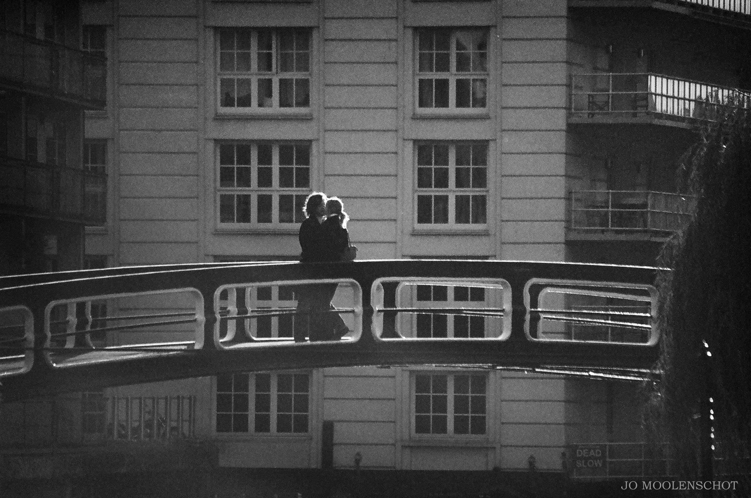 Lovers on a bridge Camden town london street photography.jpg