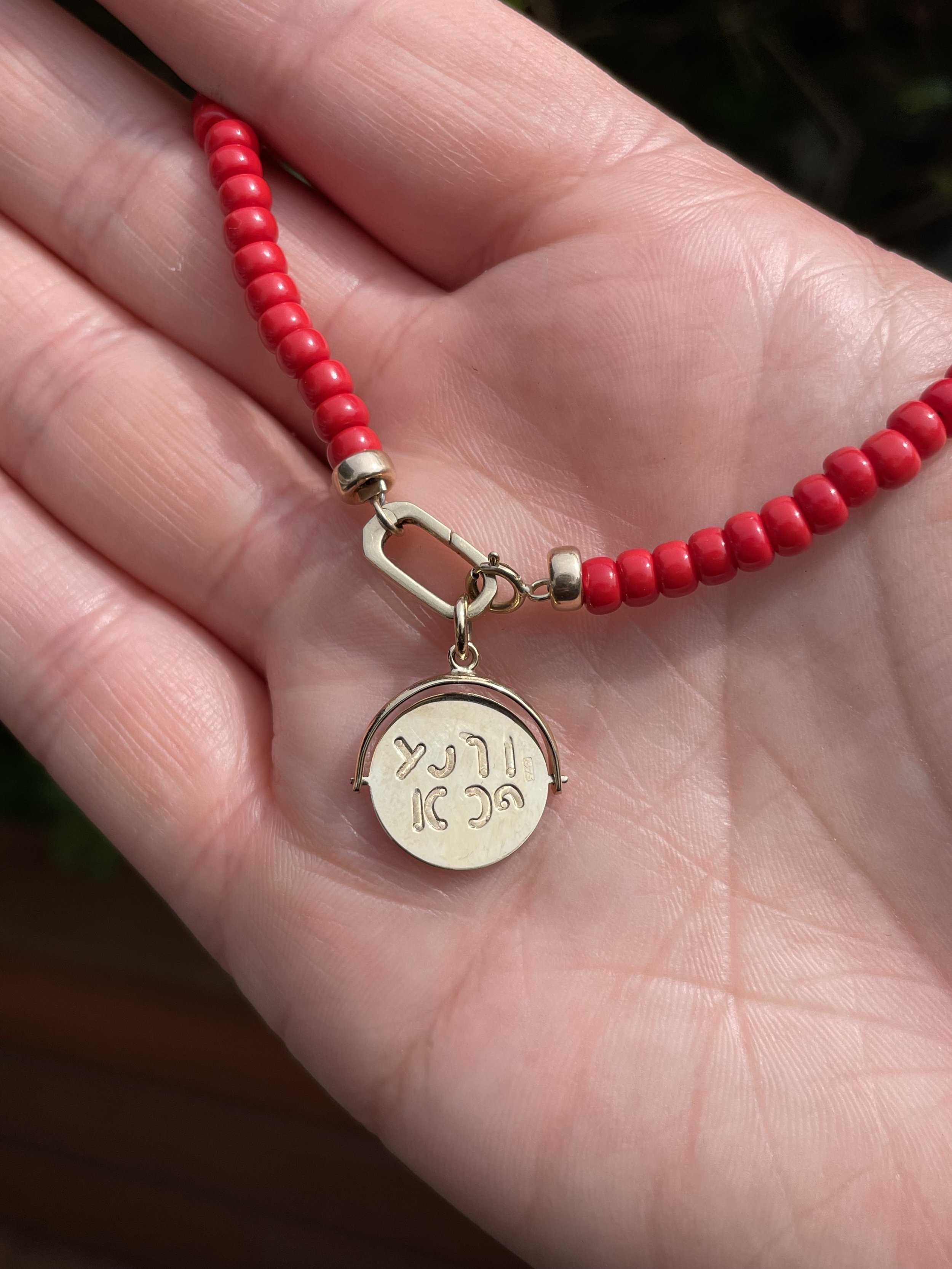 9ct gold 'Good Luck' spinner