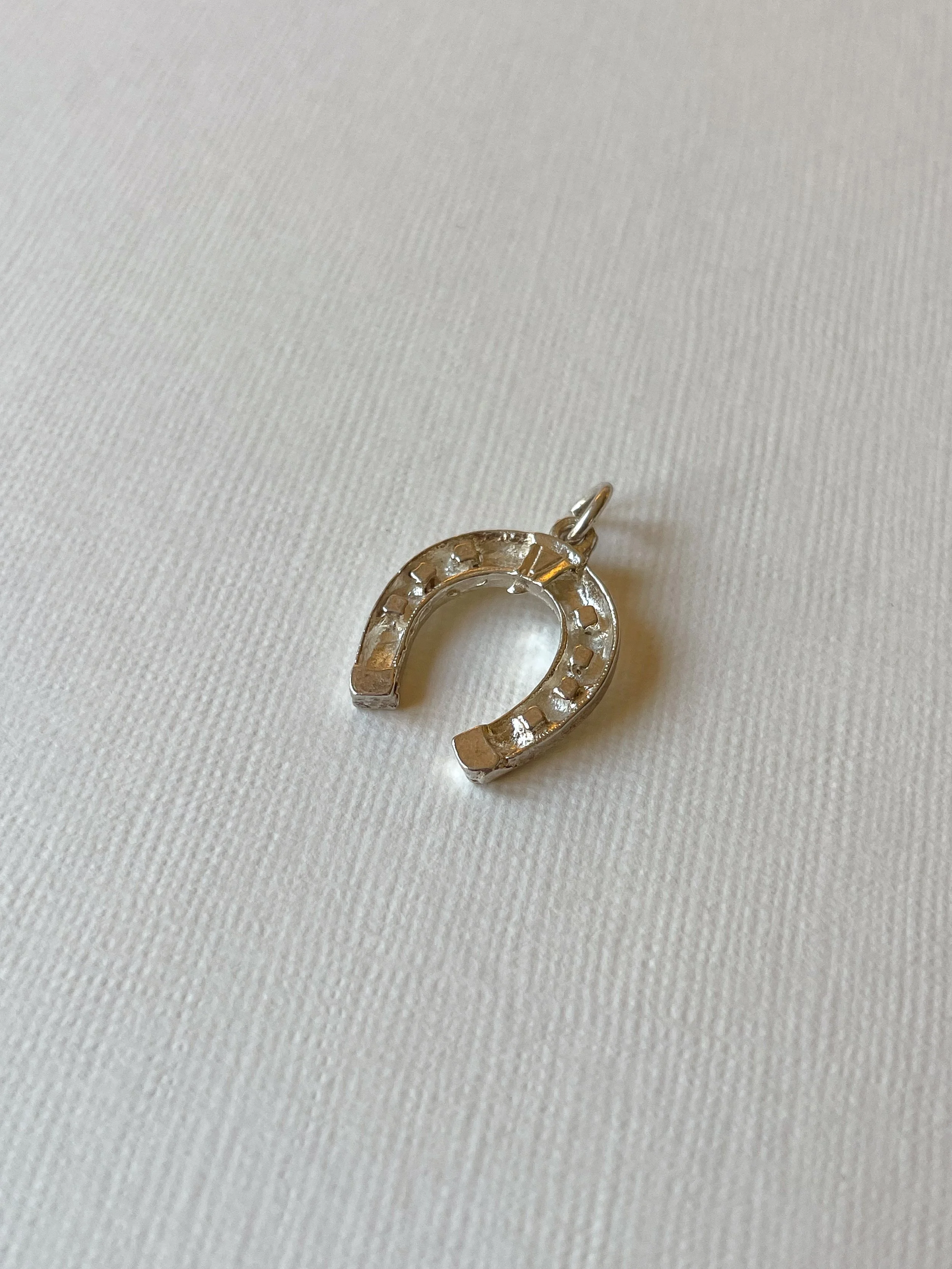 Sterling silver horseshoe charm