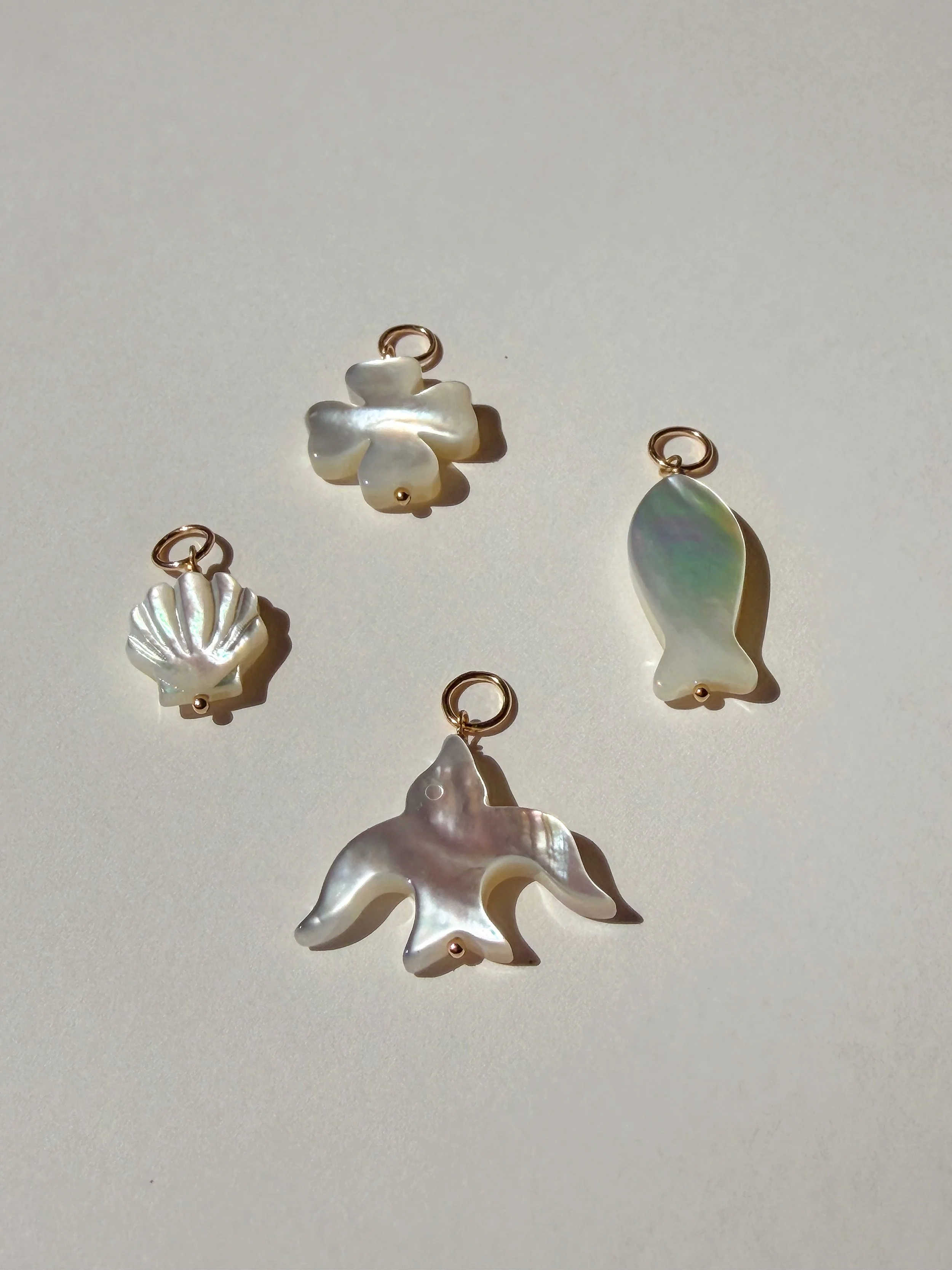 New 9ct gold mother of pearl lucky charms