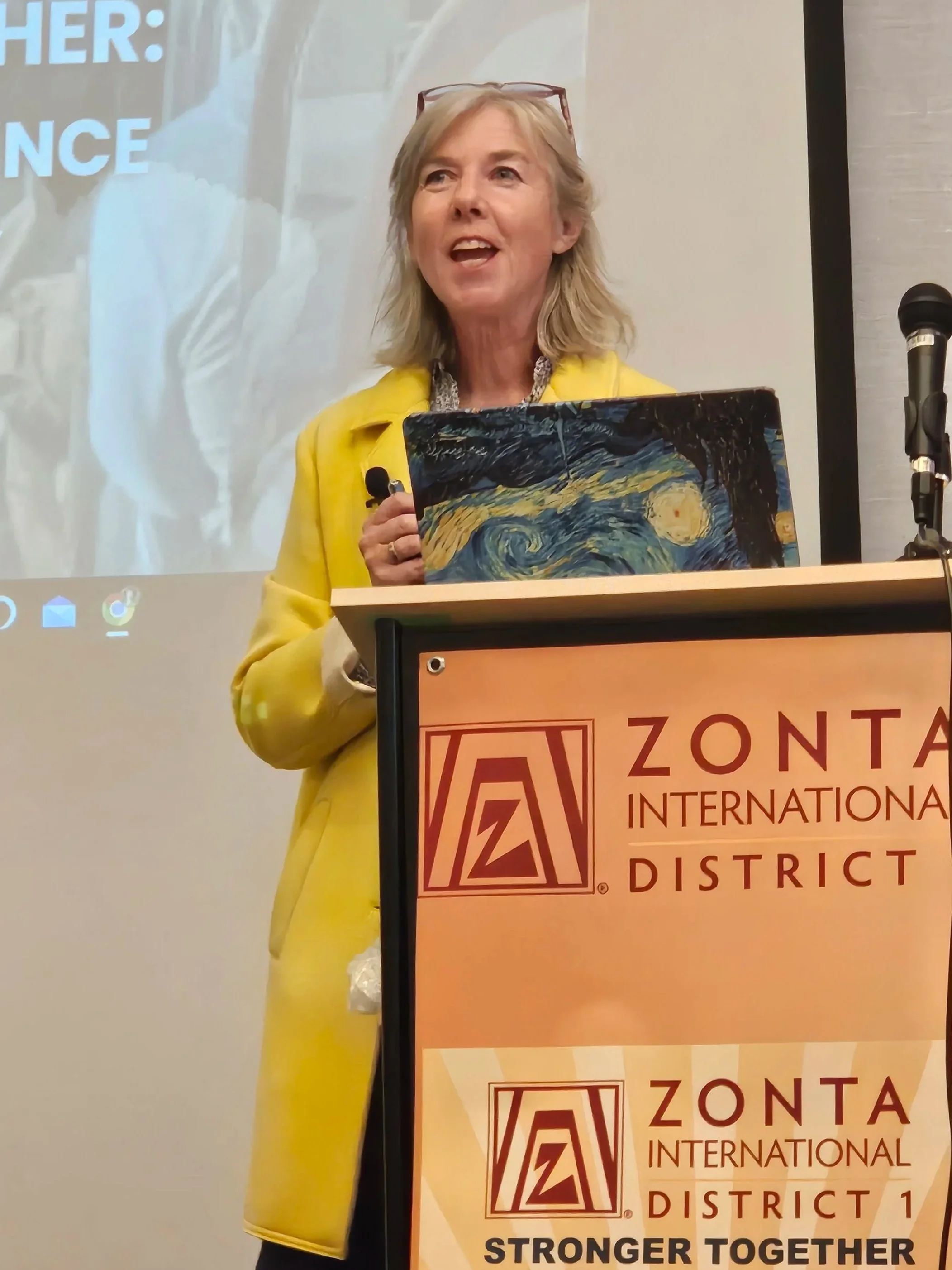 Executive coach and healthcare speaker Deb Shannon sailing off the Vermont coast, reflecting her leadership and resilience coaching approach.