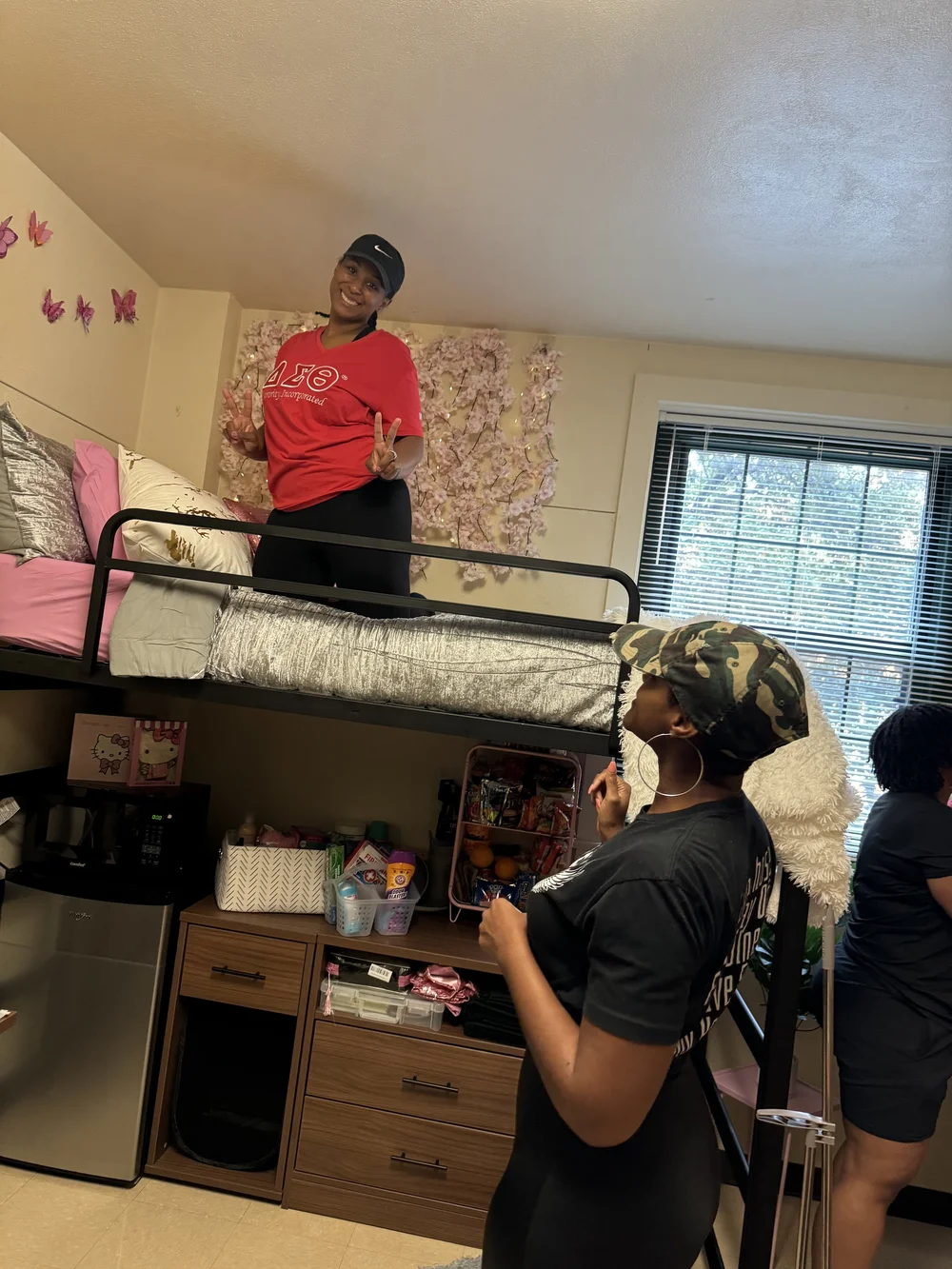 Volunteers setting up a student's room