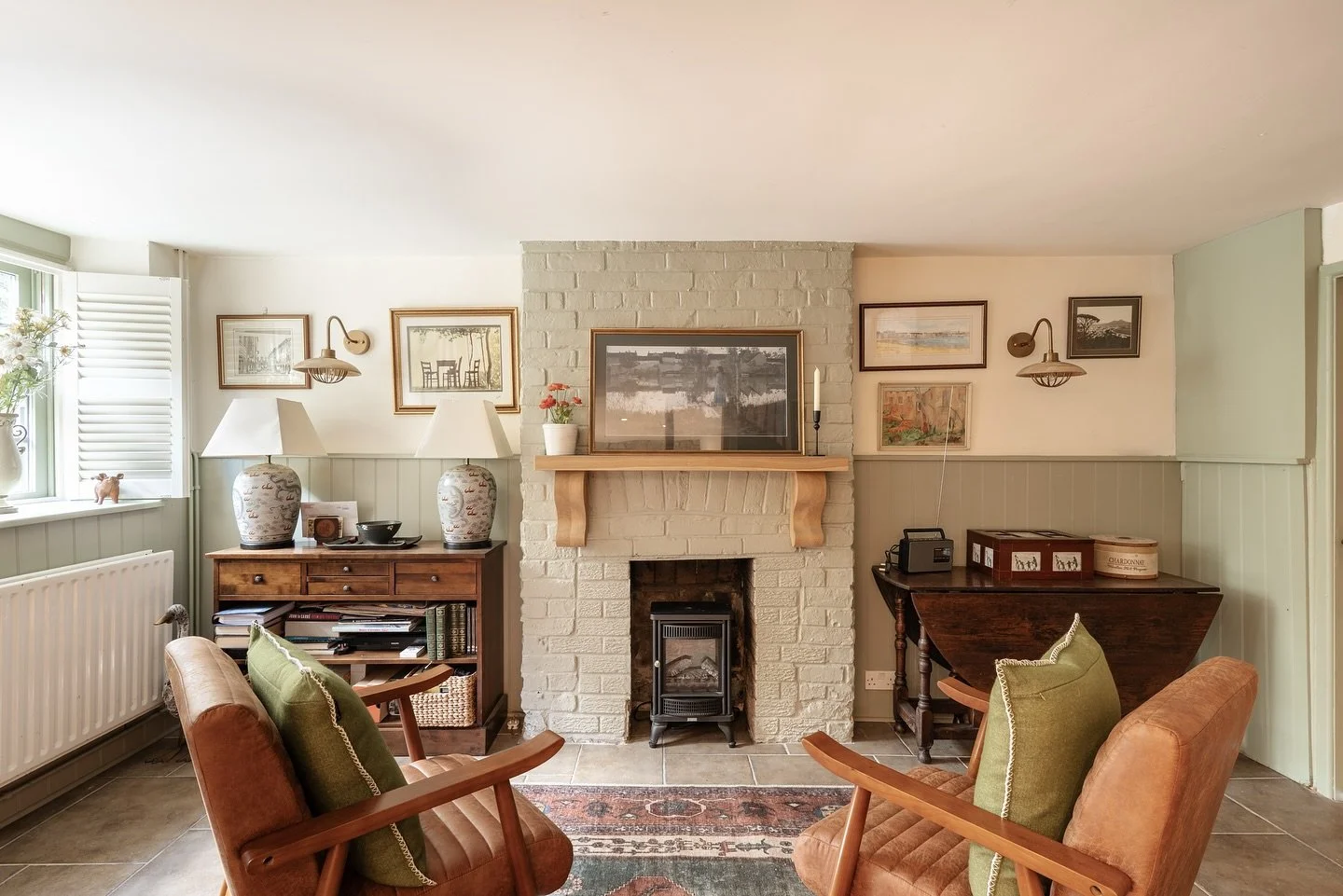 Sometimes the smallest changes create the biggest transformations.

Here, the fireplace is the focal point, by adding comfortable chairs, a rug and soft lighting to create a place to gather.

It is not just about how a room looks, but how it feels. T