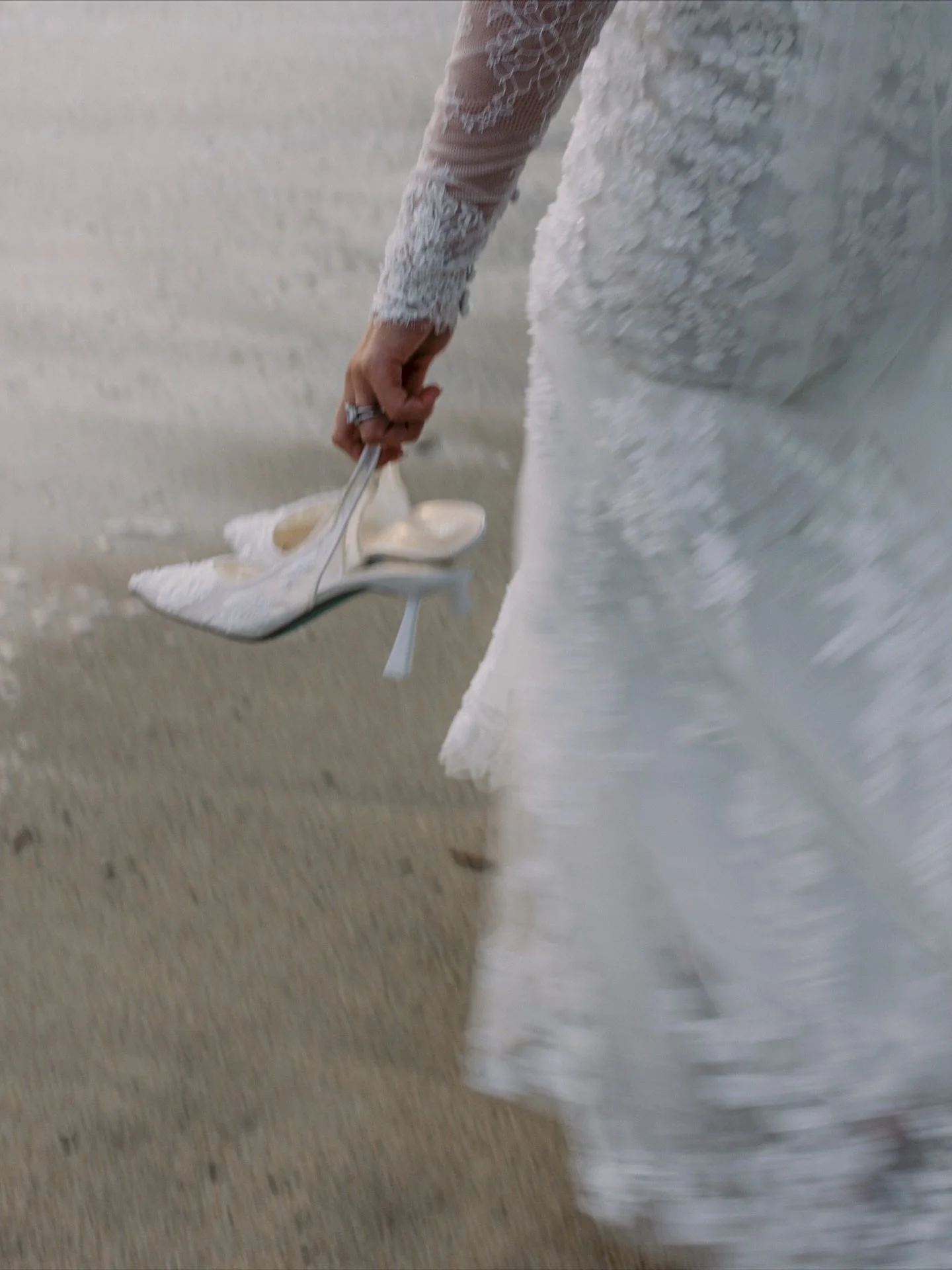 Shoes in hand, feet in the sand.
.
.
.
.
.
[ Bride running on the beach with shoes in her hands in Punta Mita after her wedding ceremony. Film and digital documentary wedding photography. ]