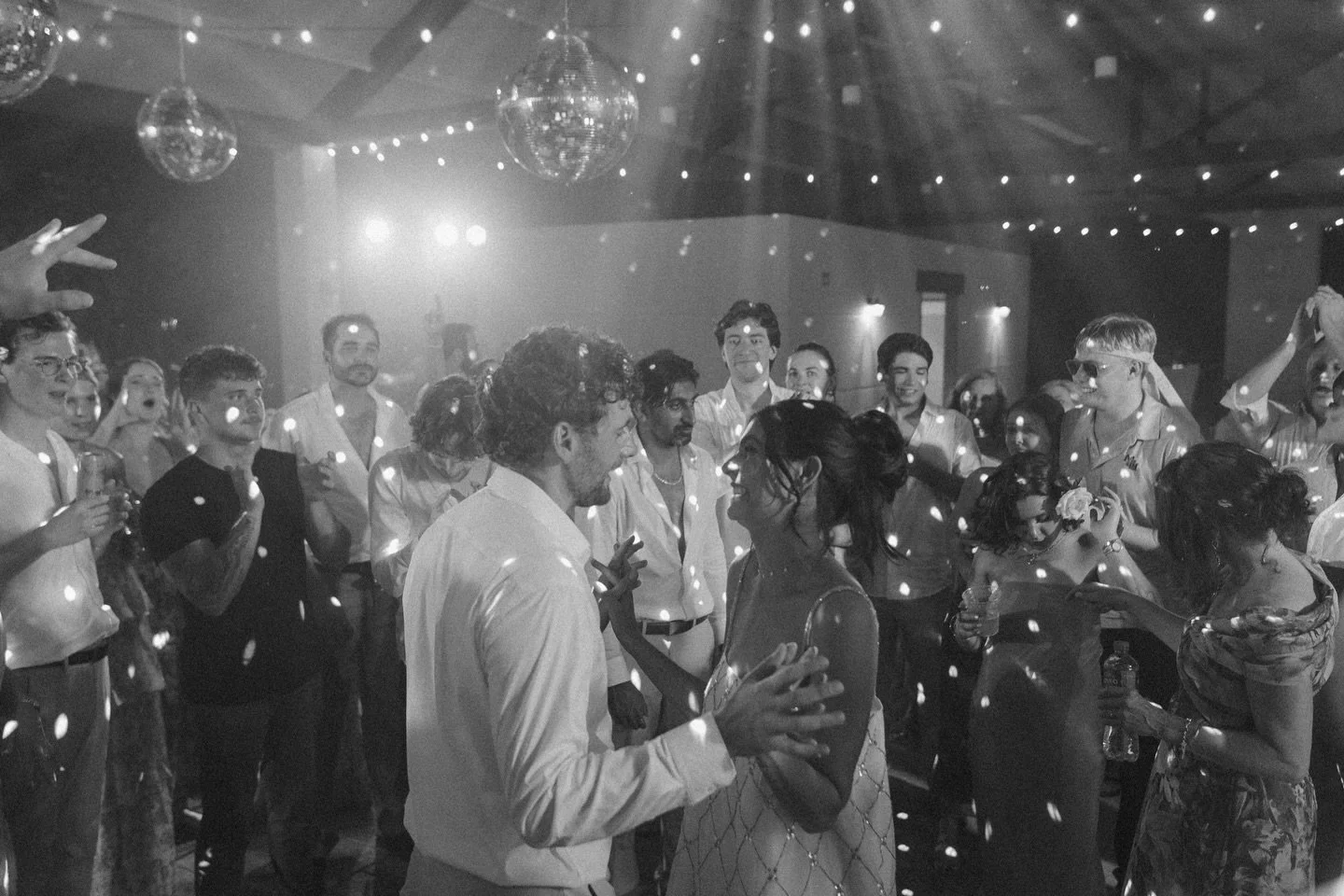Party lights ✔️
Disco balls ✔️
Smoke machine ✔️
Great music ✔️
Party people ✔️

What a great night! Beautiful and bursting with energy on the dancefloor! If you want a reception party that looks like you got married in outer space, make sure to inclu
