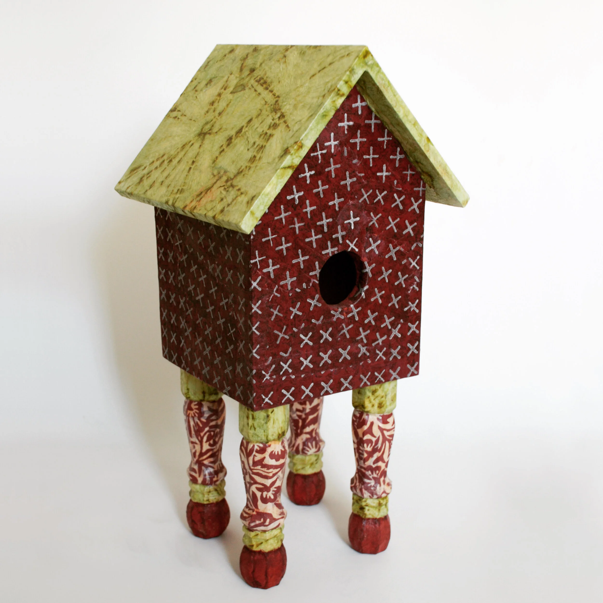 Burgandy and green birdhouse.jpeg
