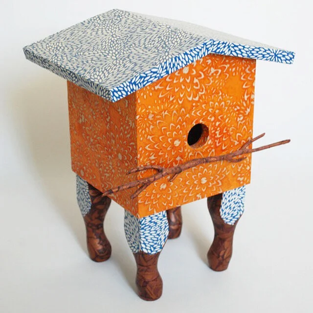 orange and blue birdhouse.jpeg