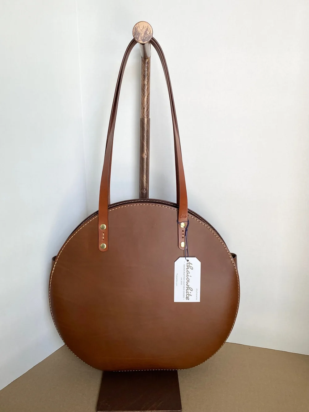 Round store satchel bag