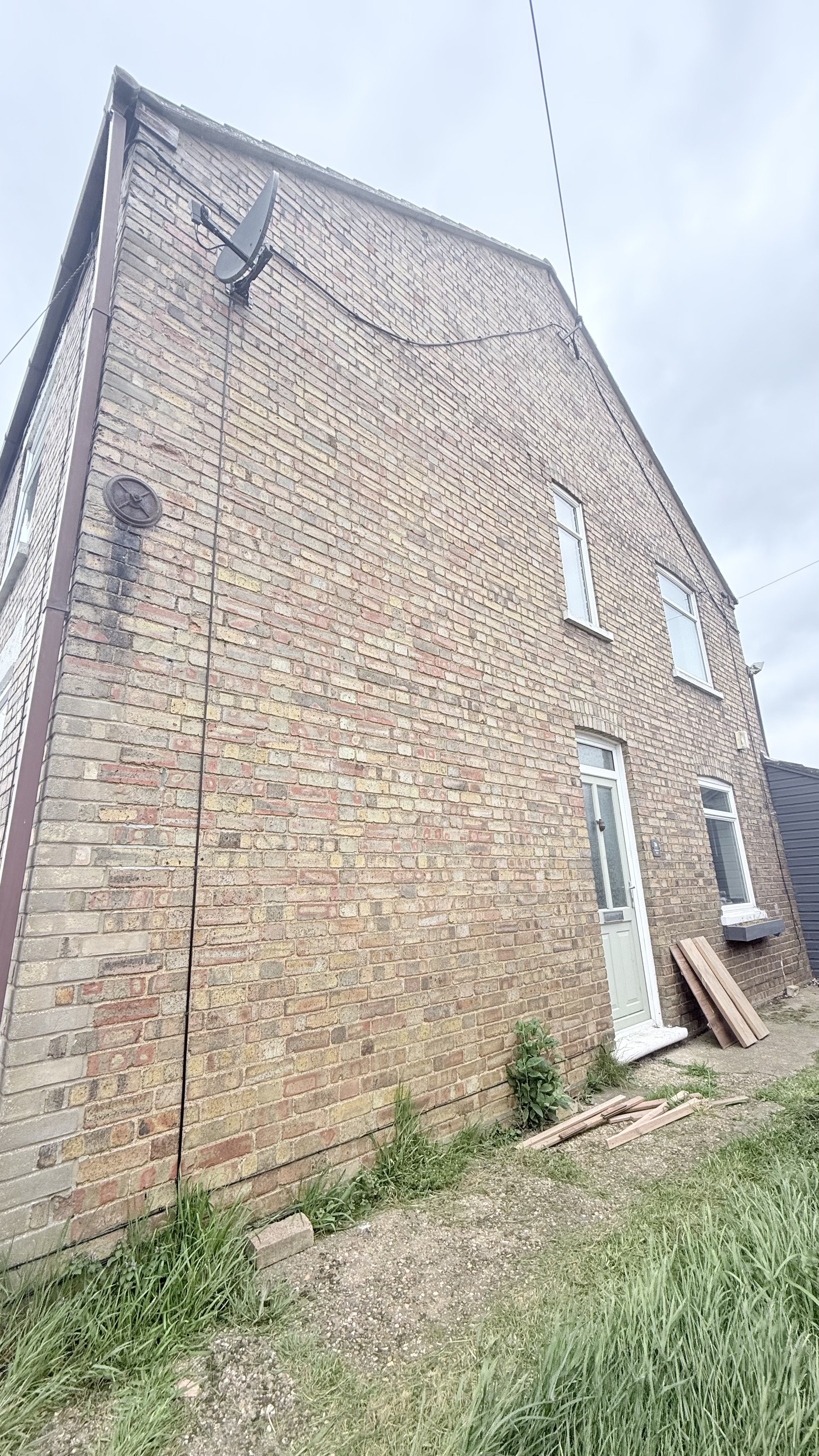 SIDE ENTRANCE TO HOUSE