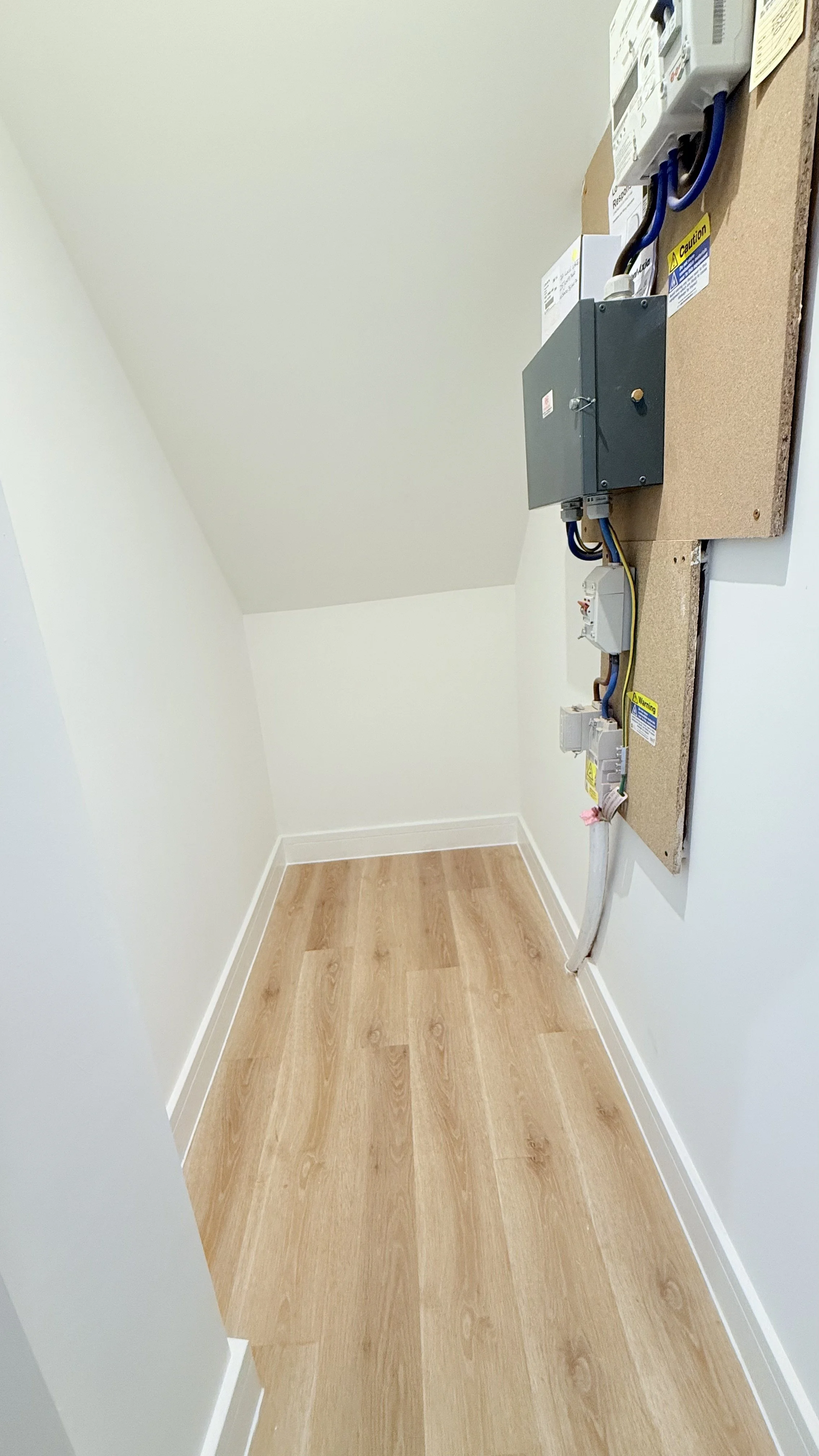 UNDERSTAIRS CUPBOARD