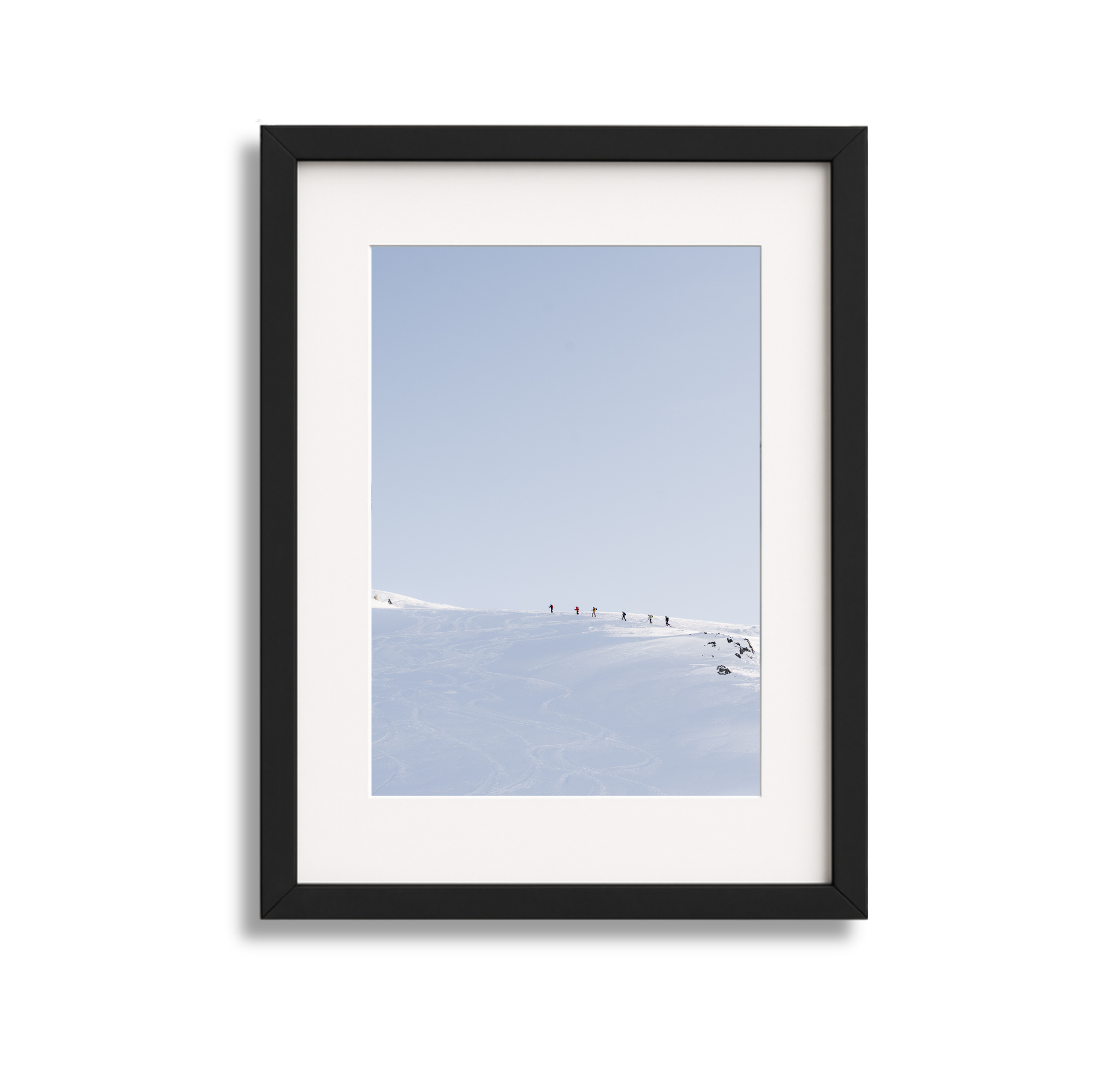 	A large framed fine art photography print which shows several backcountry skiers in Whistler Mountain.
