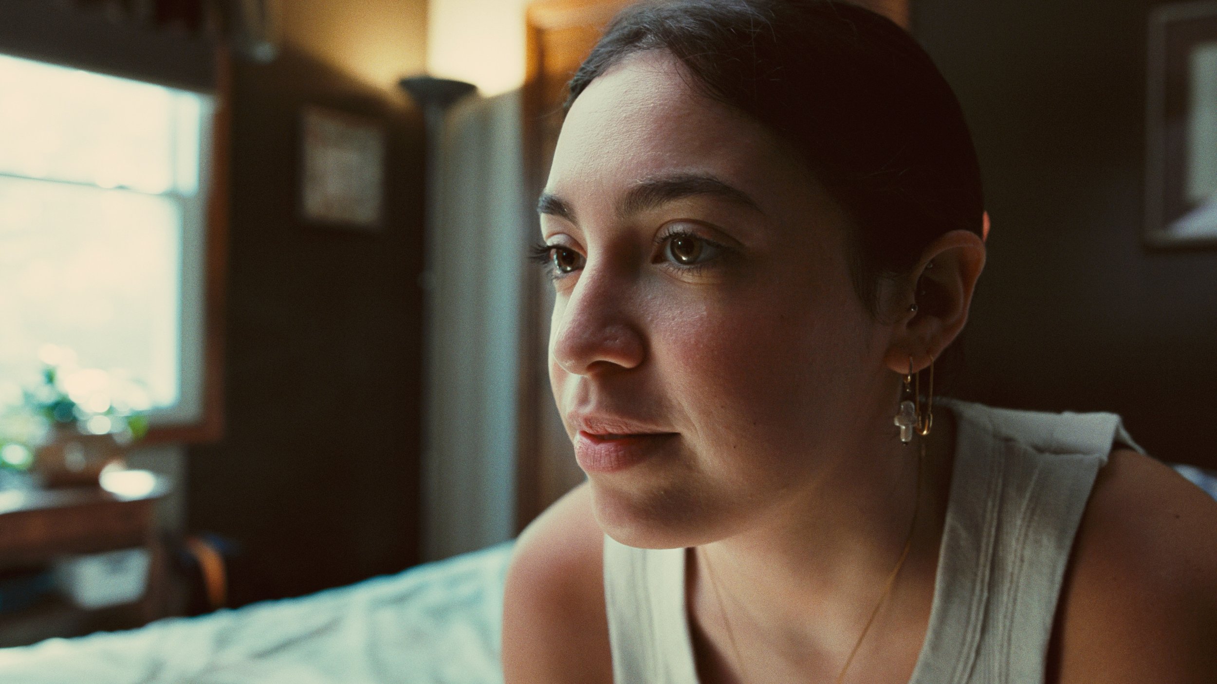 Portrait of young woman colored with Kodak Ektachrome film emulation