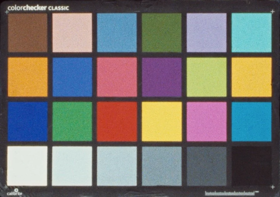ColorChecker Classic chart with 24 color patches arranged in a grid, used for color calibration in photography and printing.