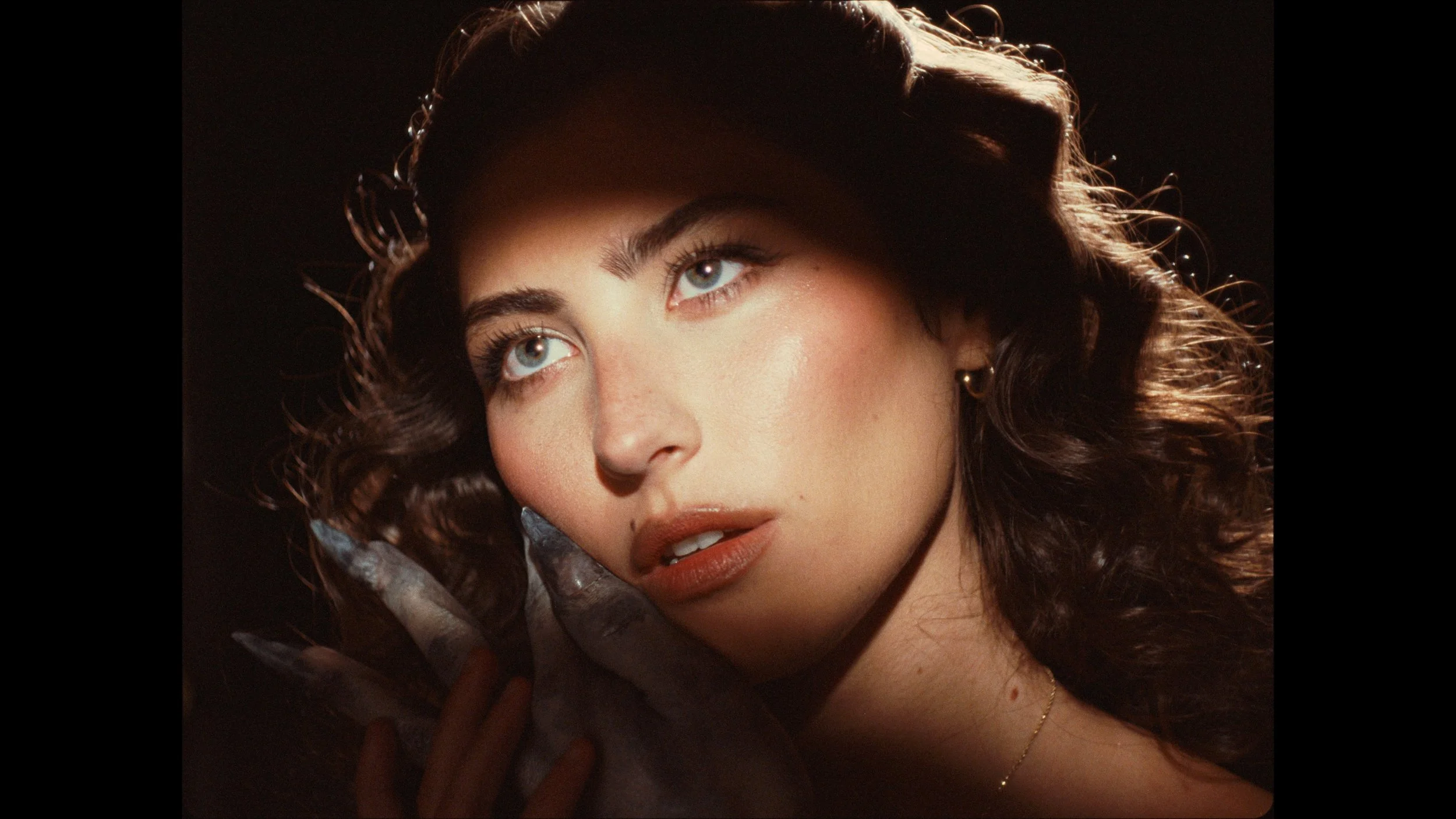 Portrait of woman with old Hollywood glamour lighting