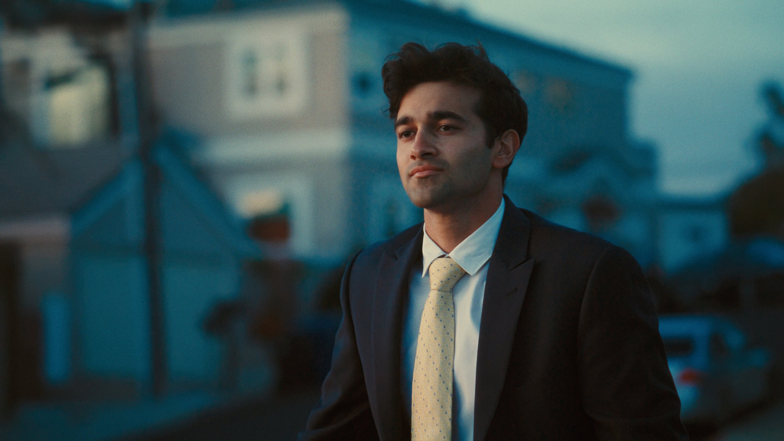 Man in suit color graded with cinematic Kodak Ektachrome film emulation 