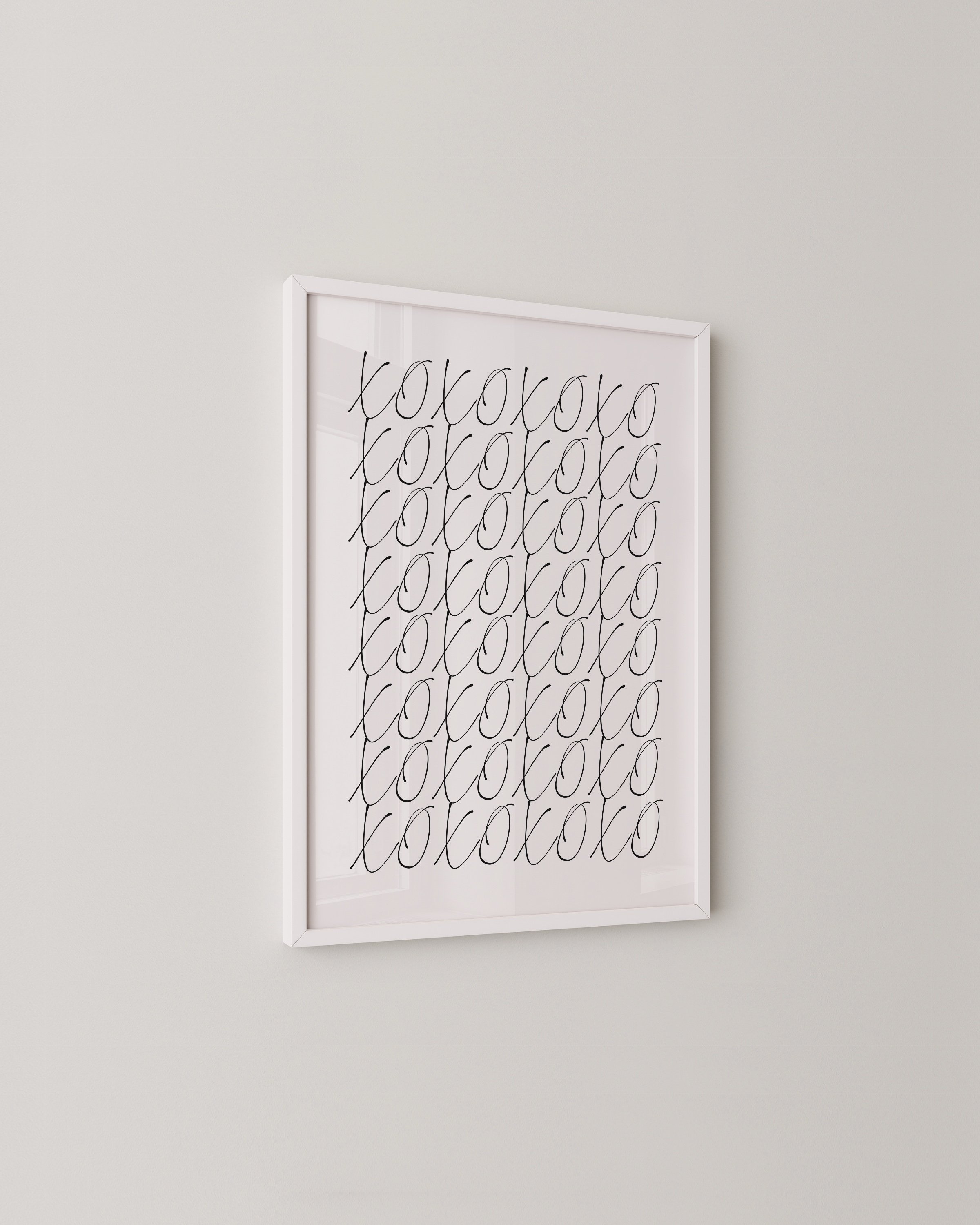 Minimalist black and white XOXO print with hand-lettered typography, perfect for adding a sweet, modern touch to any space.