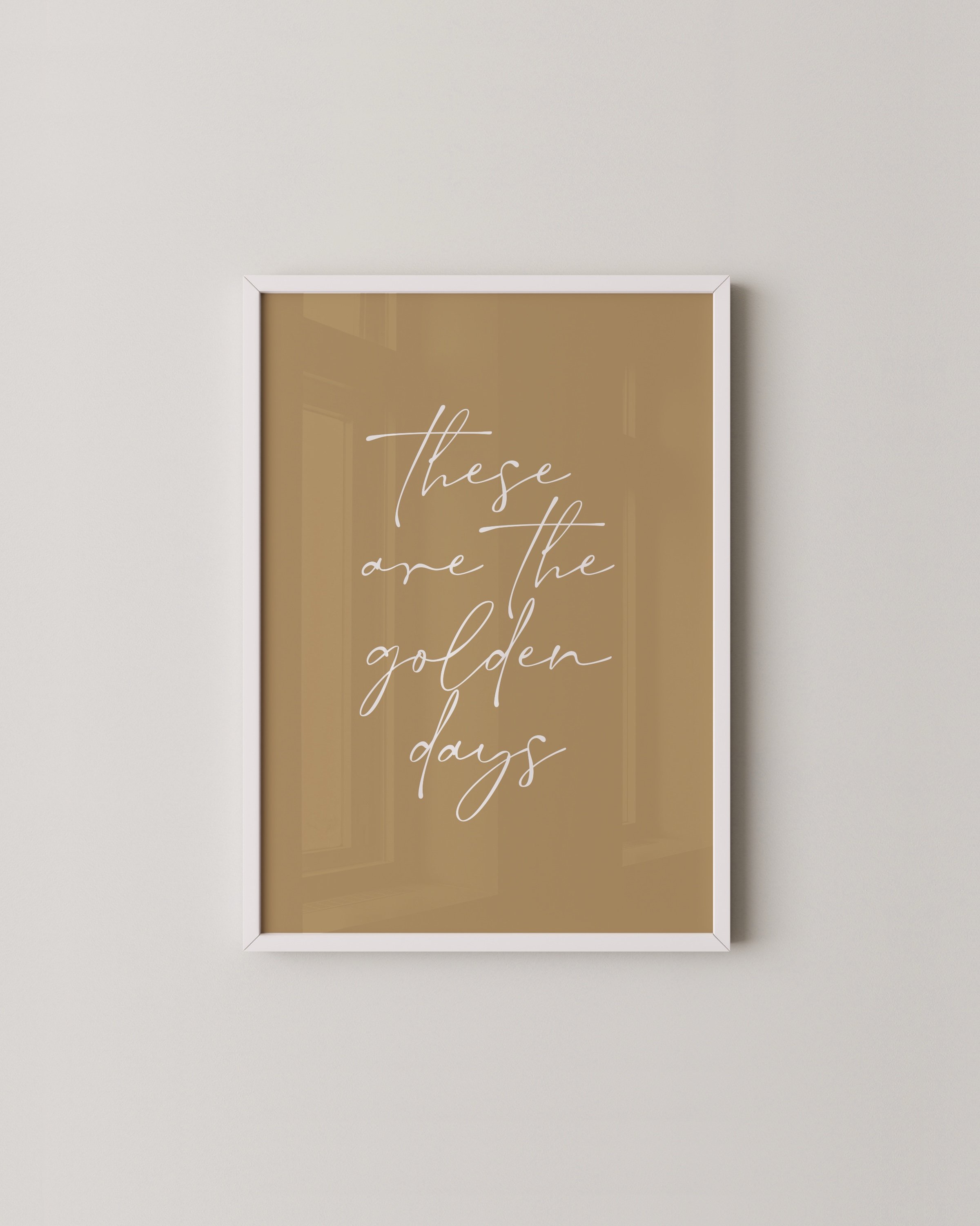 Minimalist wall art with the inspirational quote ‘These Are the Golden Days’ in elegant script.