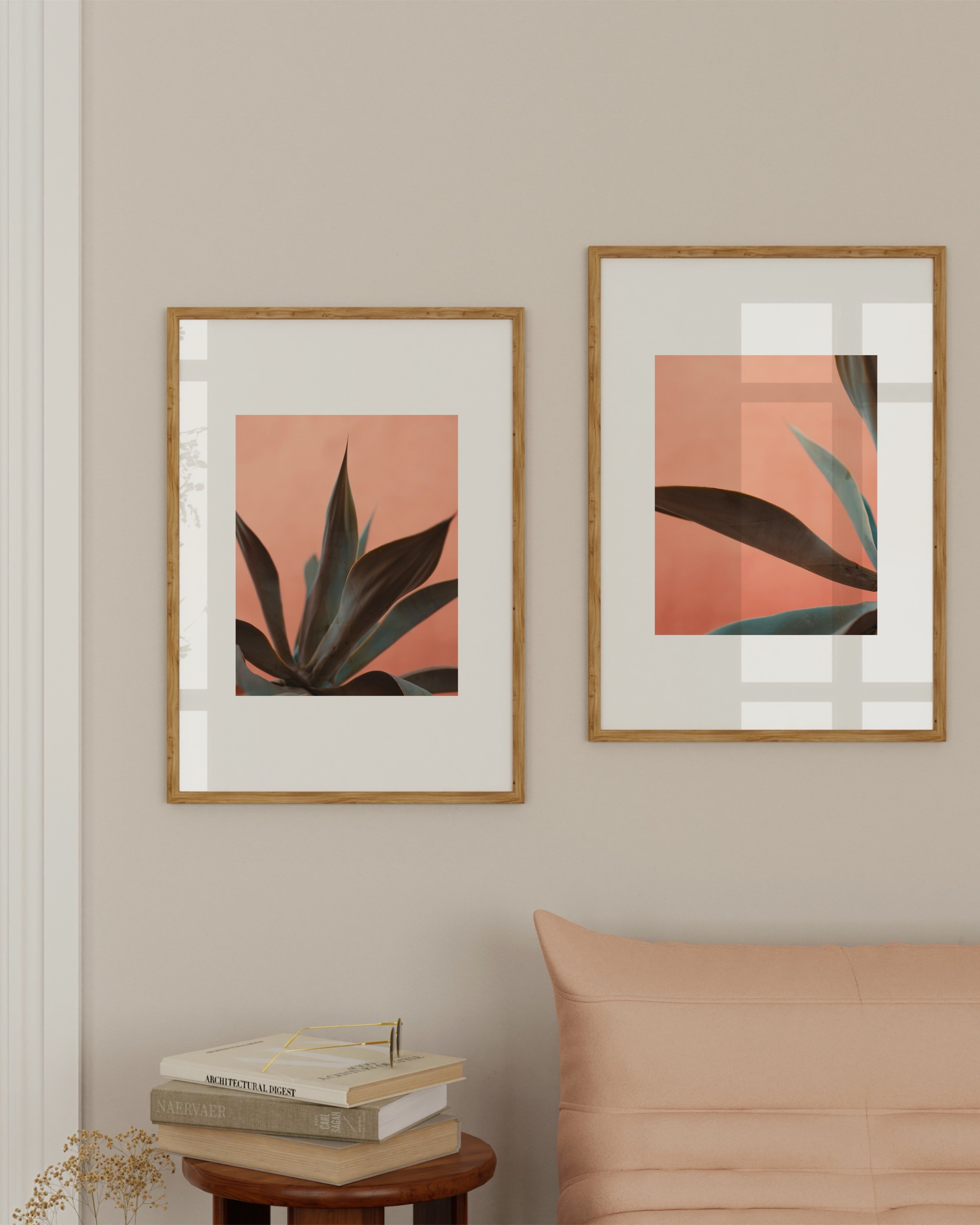 Set of two minimalist botanical prints featuring close-up images of succulent leaves against a soft pink background.