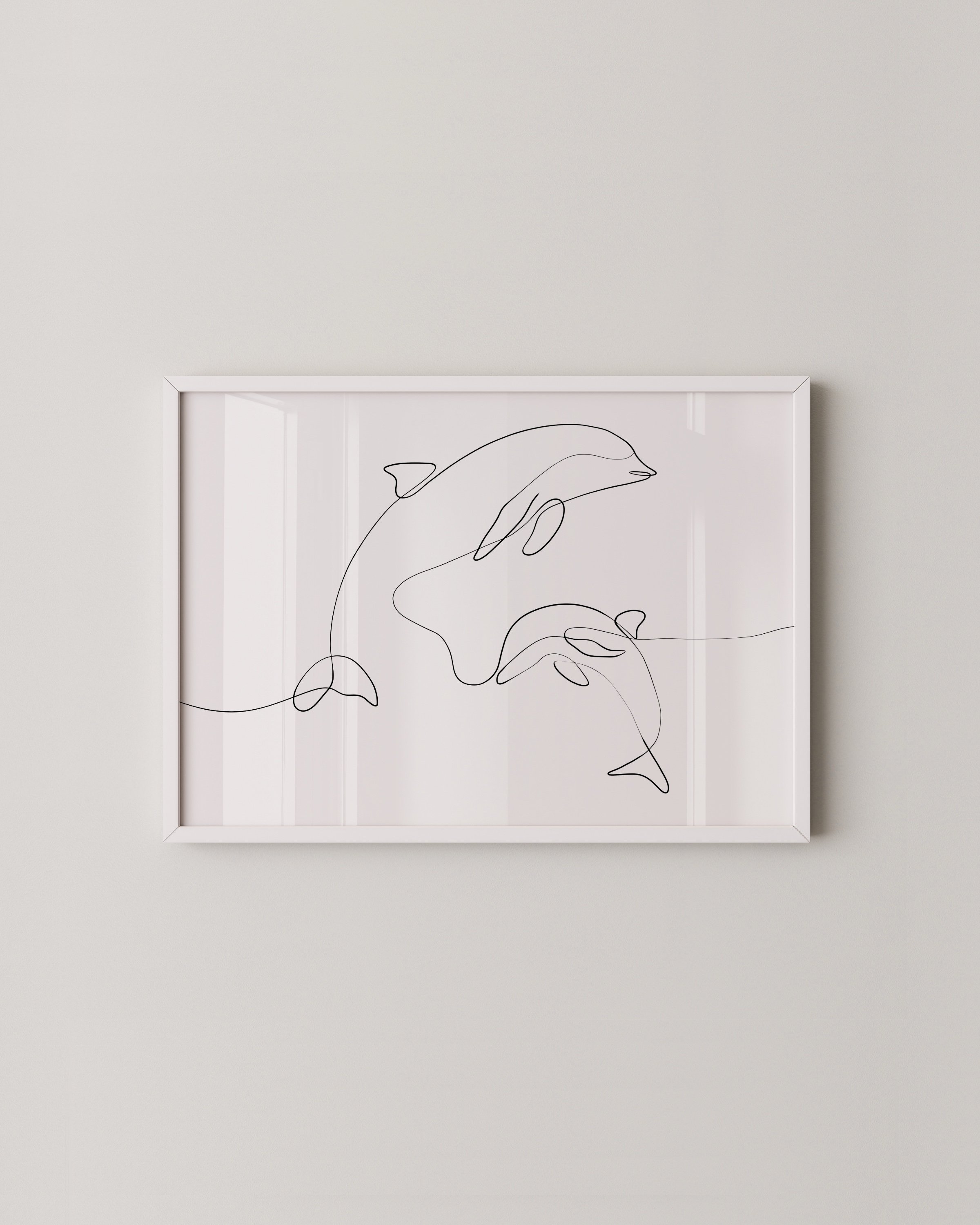 Minimalist line art print featuring dolphins swimming, created in a continuous line style for an elegant marine decor addition.