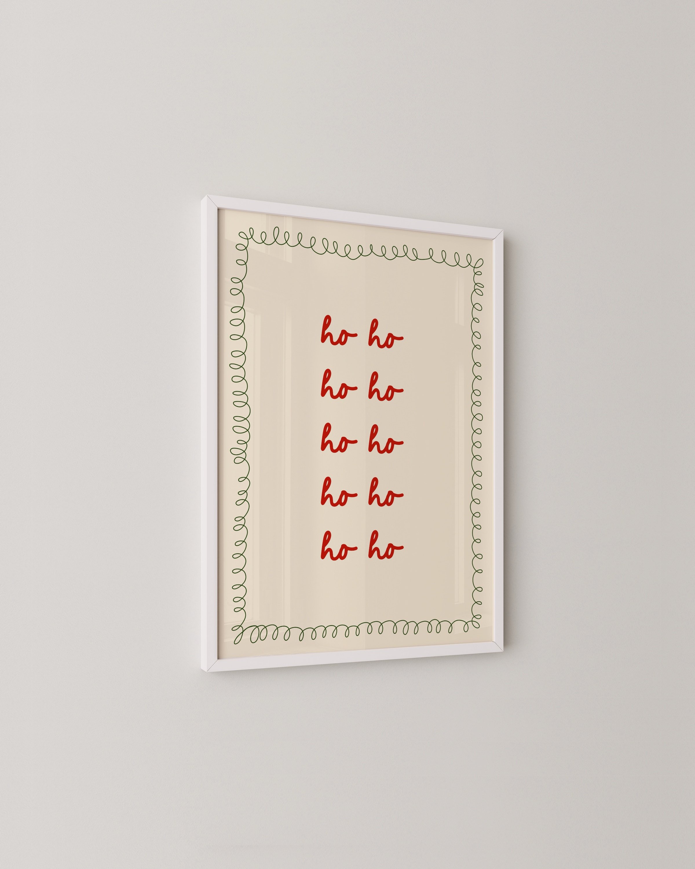Christmas printable art with repeated red ‘Ho Ho Ho’ text in a handwritten style, framed by a green squiggle border on a beige background.