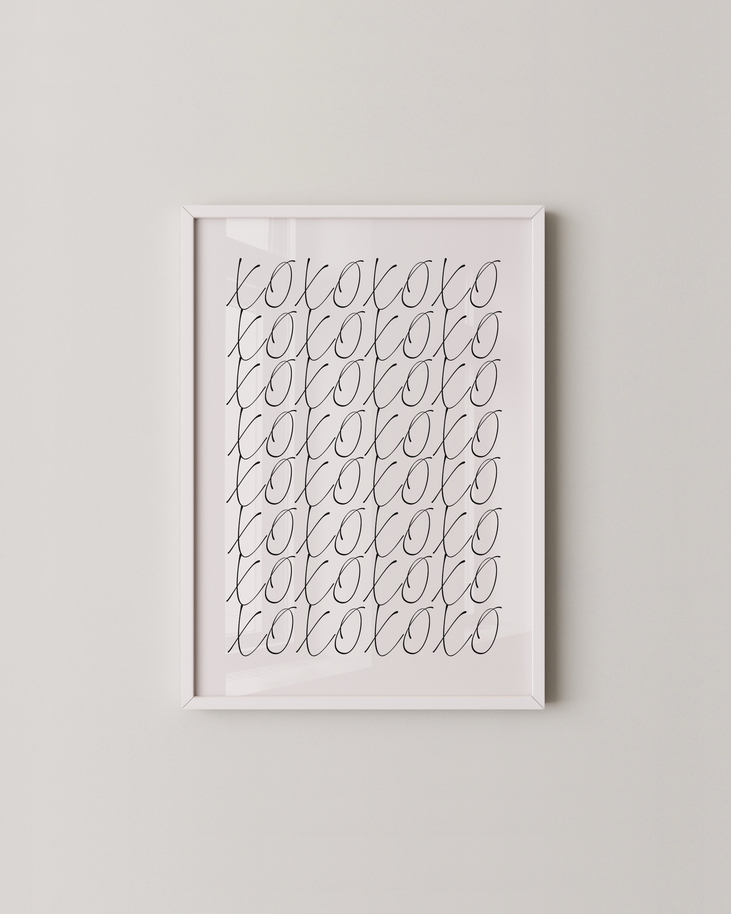Minimalist black and white XOXO print with hand-lettered typography, perfect for adding a sweet, modern touch to any space.