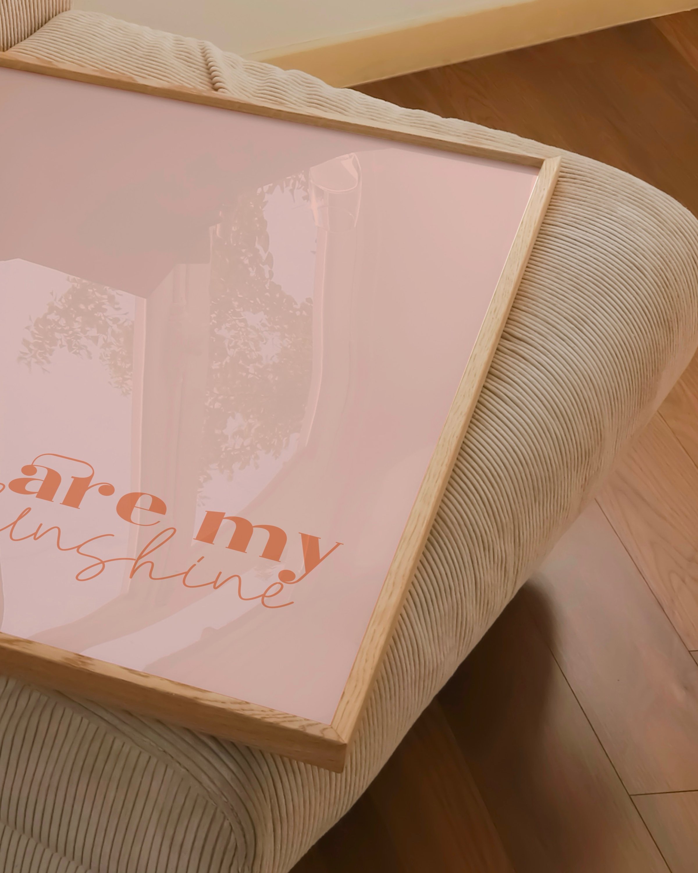 “You Are My Sunshine” wall art in warm peach tones, featuring an inspirational quote in a minimalist style.