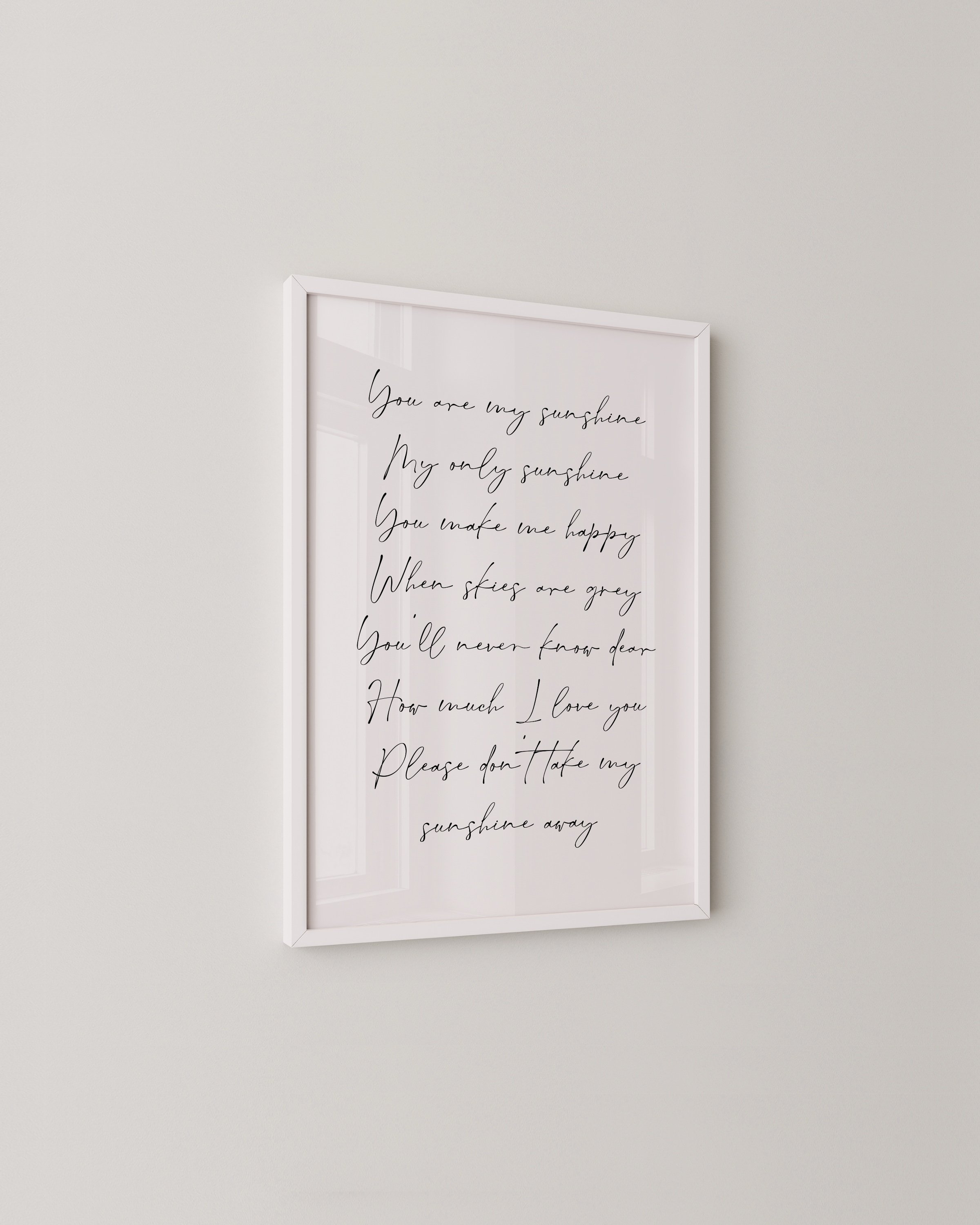 Elegant wall art featuring the lyrics ‘You Are My Sunshine’ in delicate handwritten script, perfect for nursery or bedroom decor.