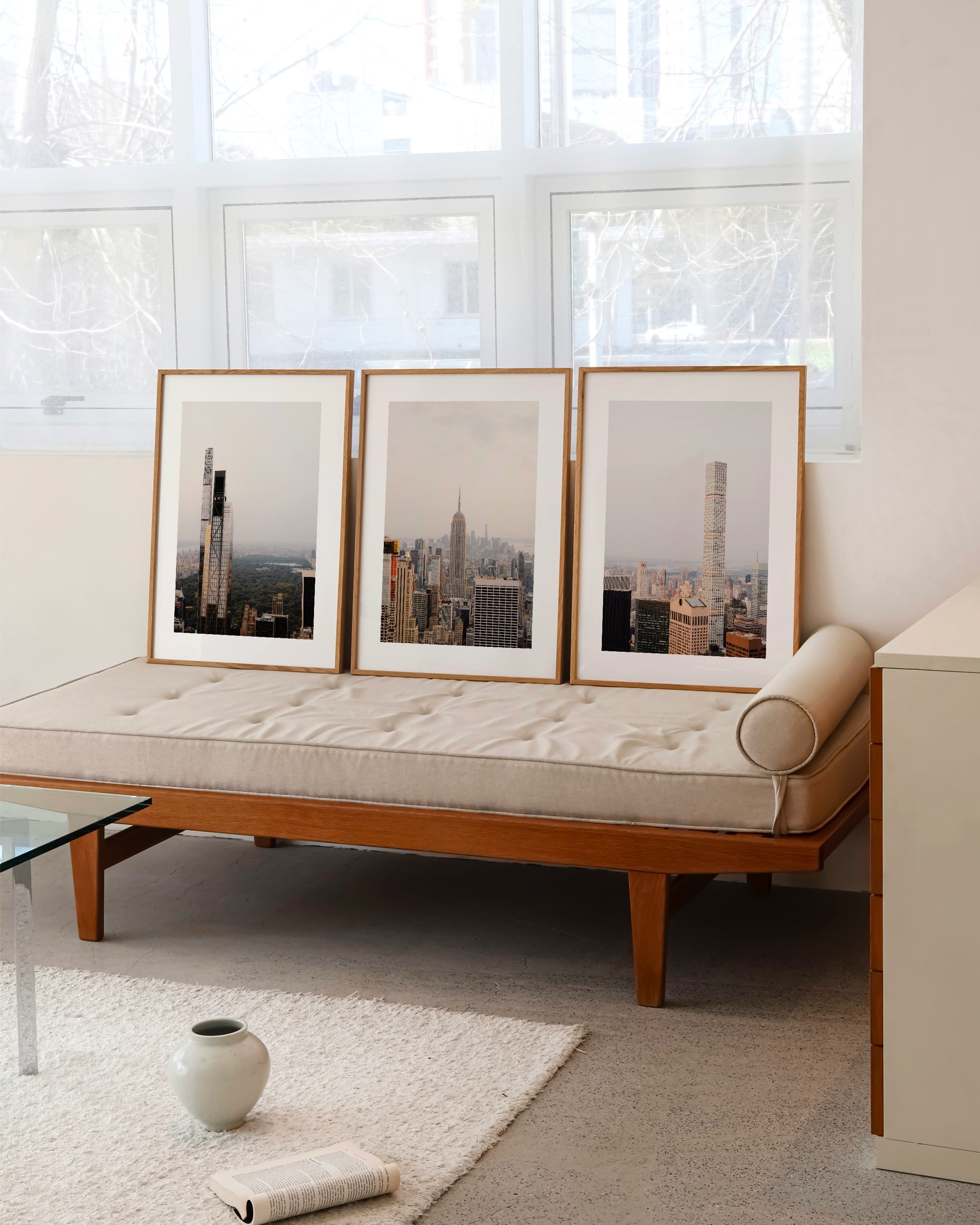 Set of three New York City skyline photography prints featuring iconic skyscrapers, including the Empire State Building and modern high-rises with views of Central Park.