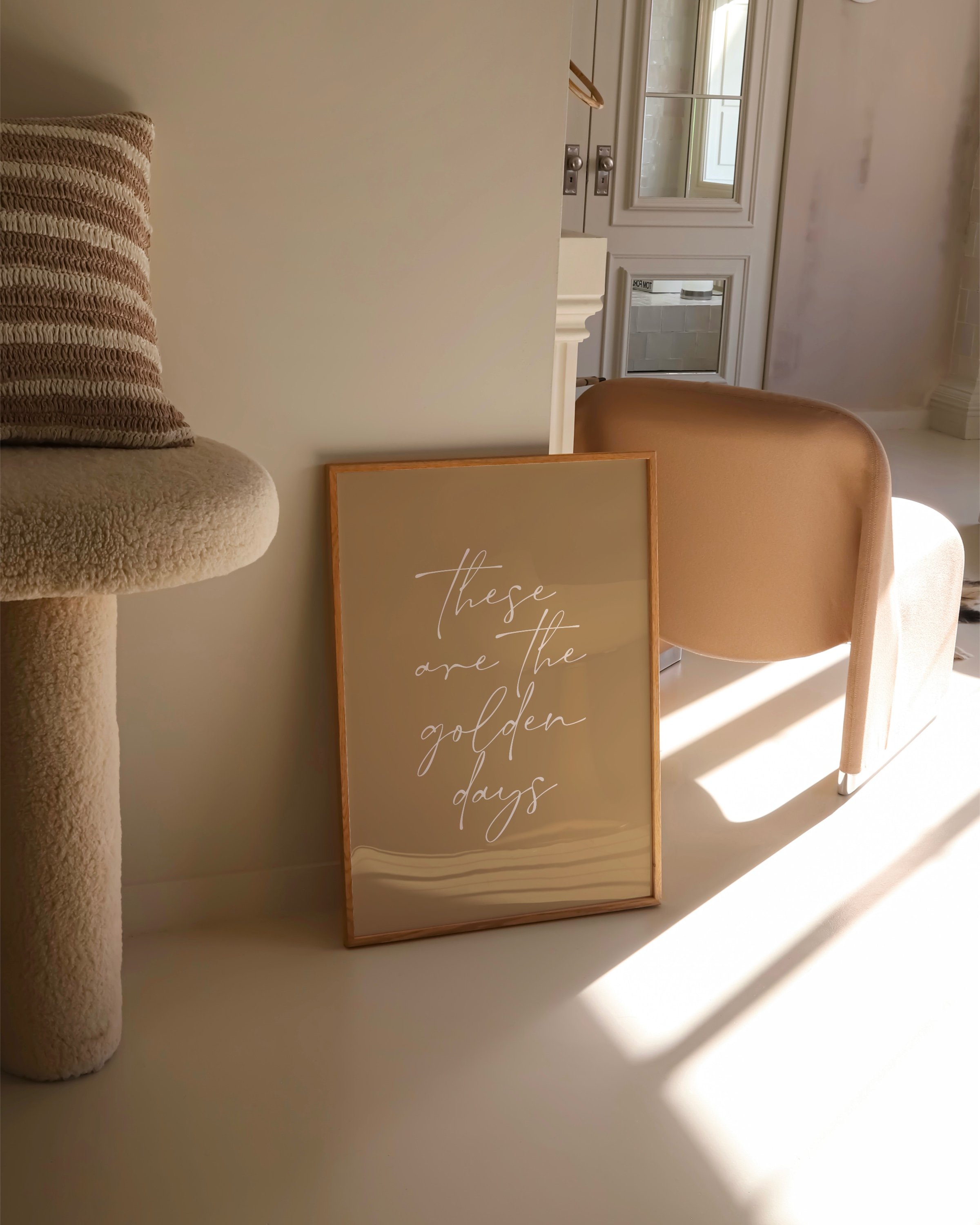 Minimalist wall art with the inspirational quote ‘These Are the Golden Days’ in elegant script.