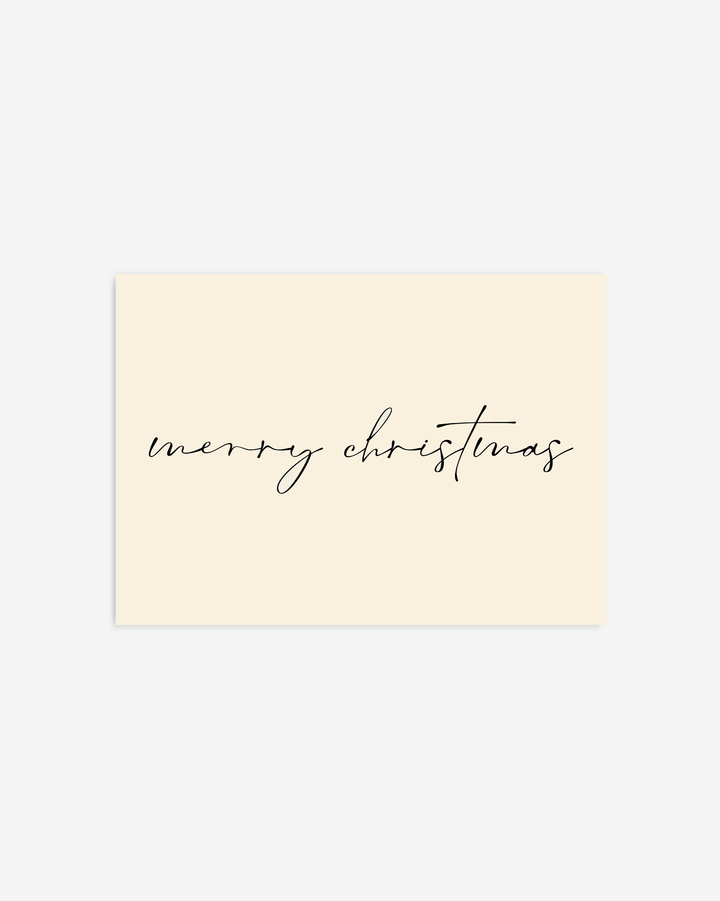 Minimalist Merry Christmas wall art with black calligraphy on a light background