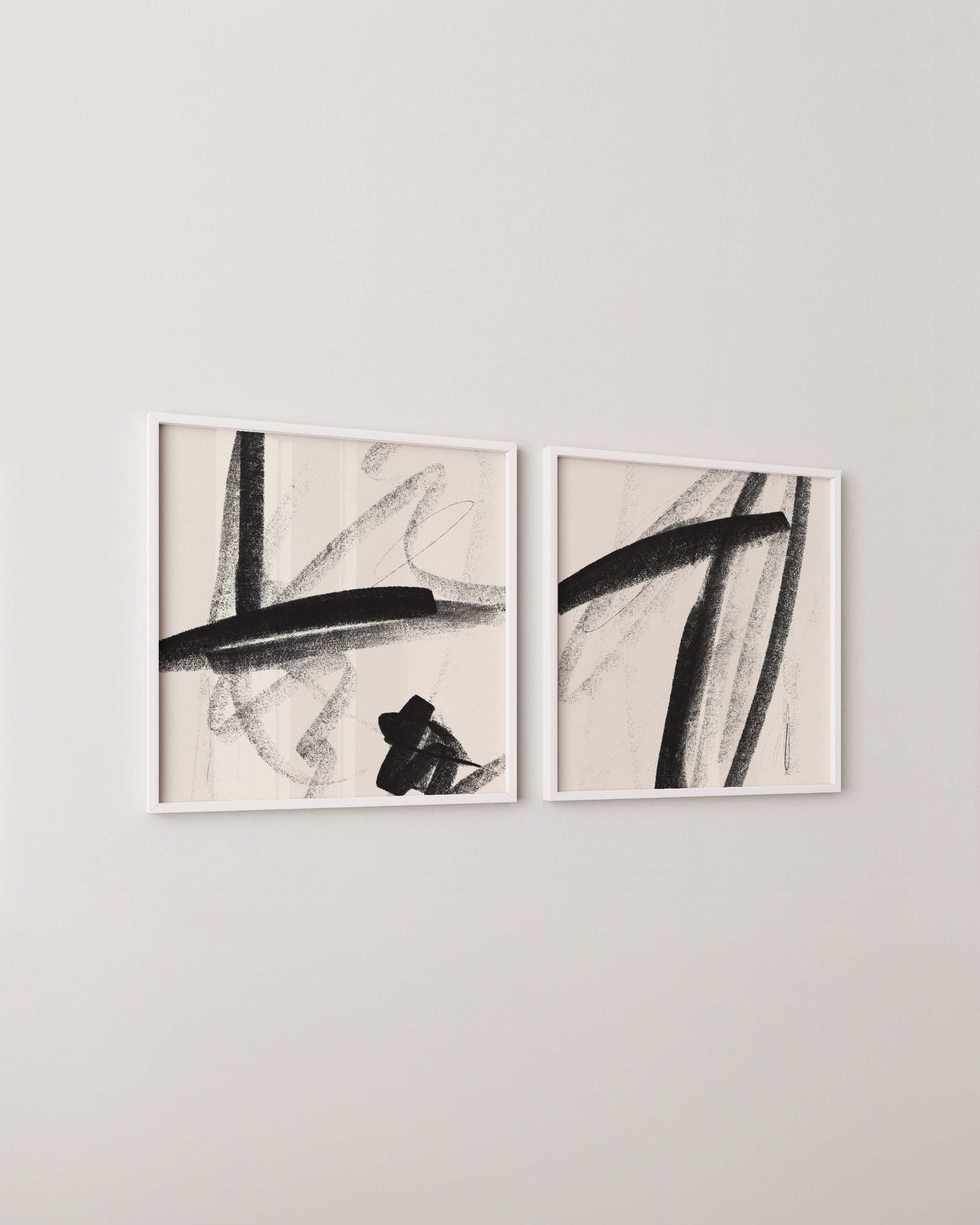 Set of two black and beige abstract brushstroke prints for modern minimalist decor.