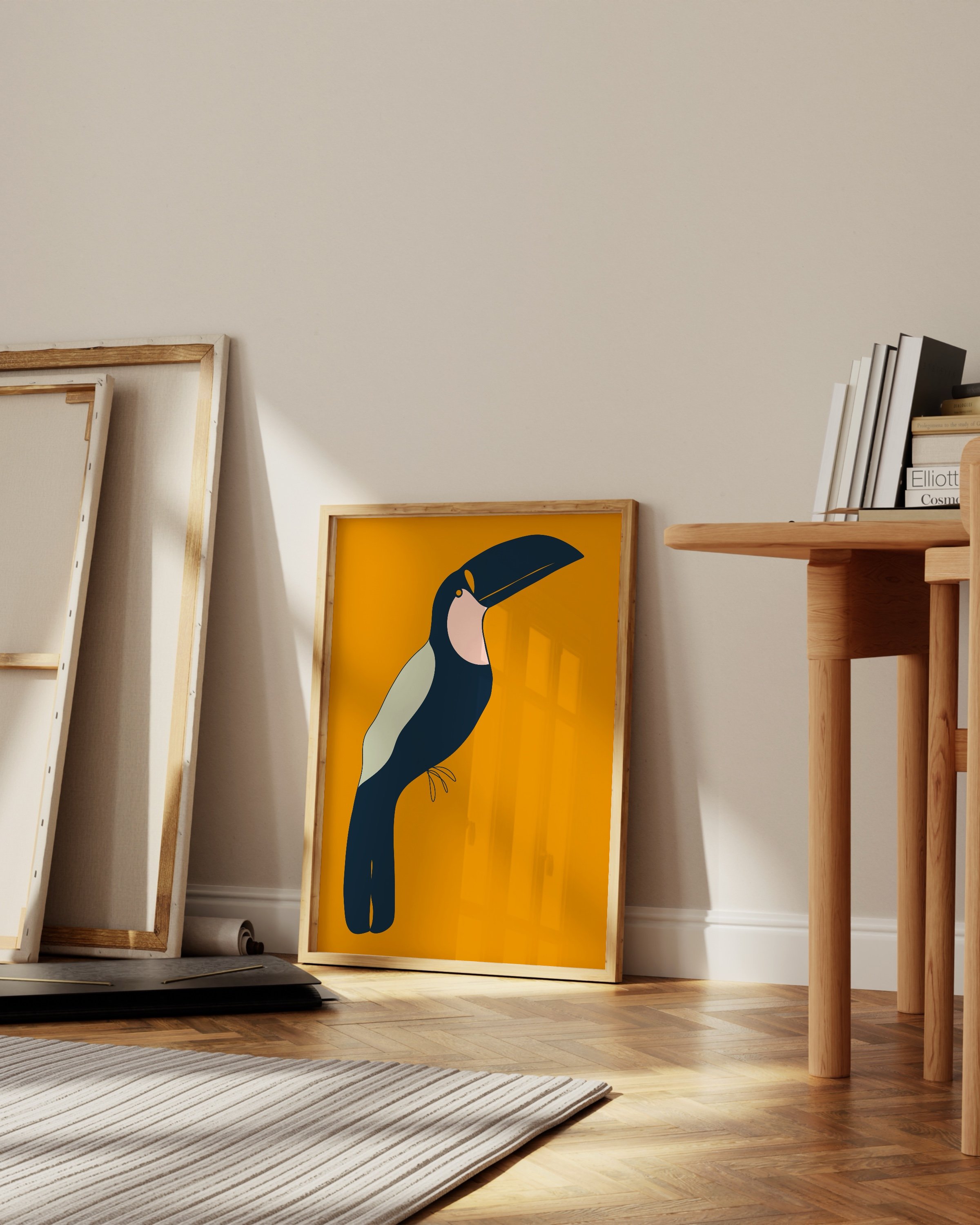 Bold toucan art print with a striking navy and pink toucan against a vibrant orange background, perfect for tropical or kids’ room decor.