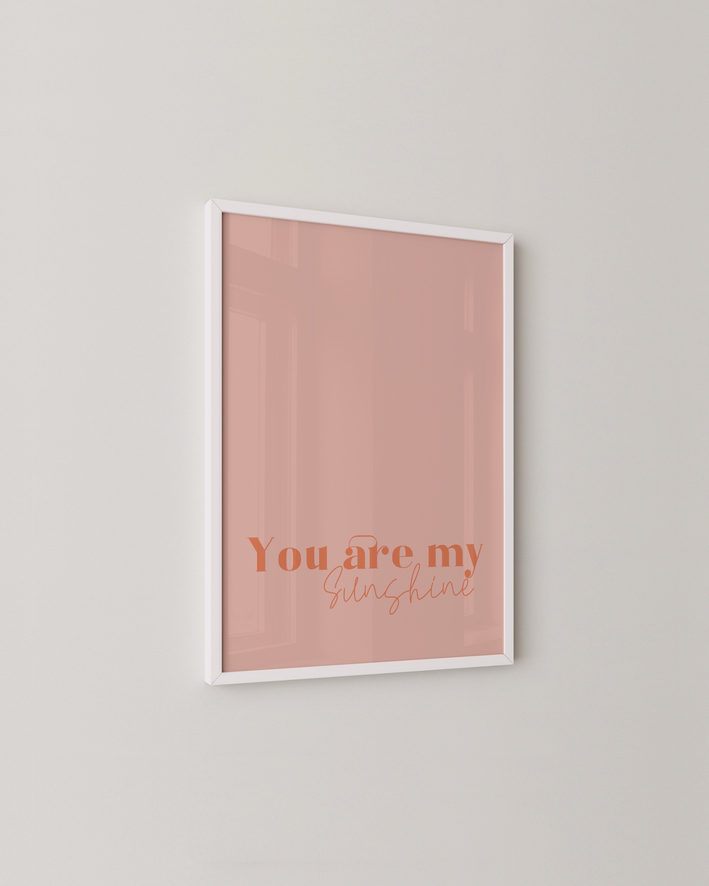 “You Are My Sunshine” wall art in warm peach tones, featuring an inspirational quote in a minimalist style.