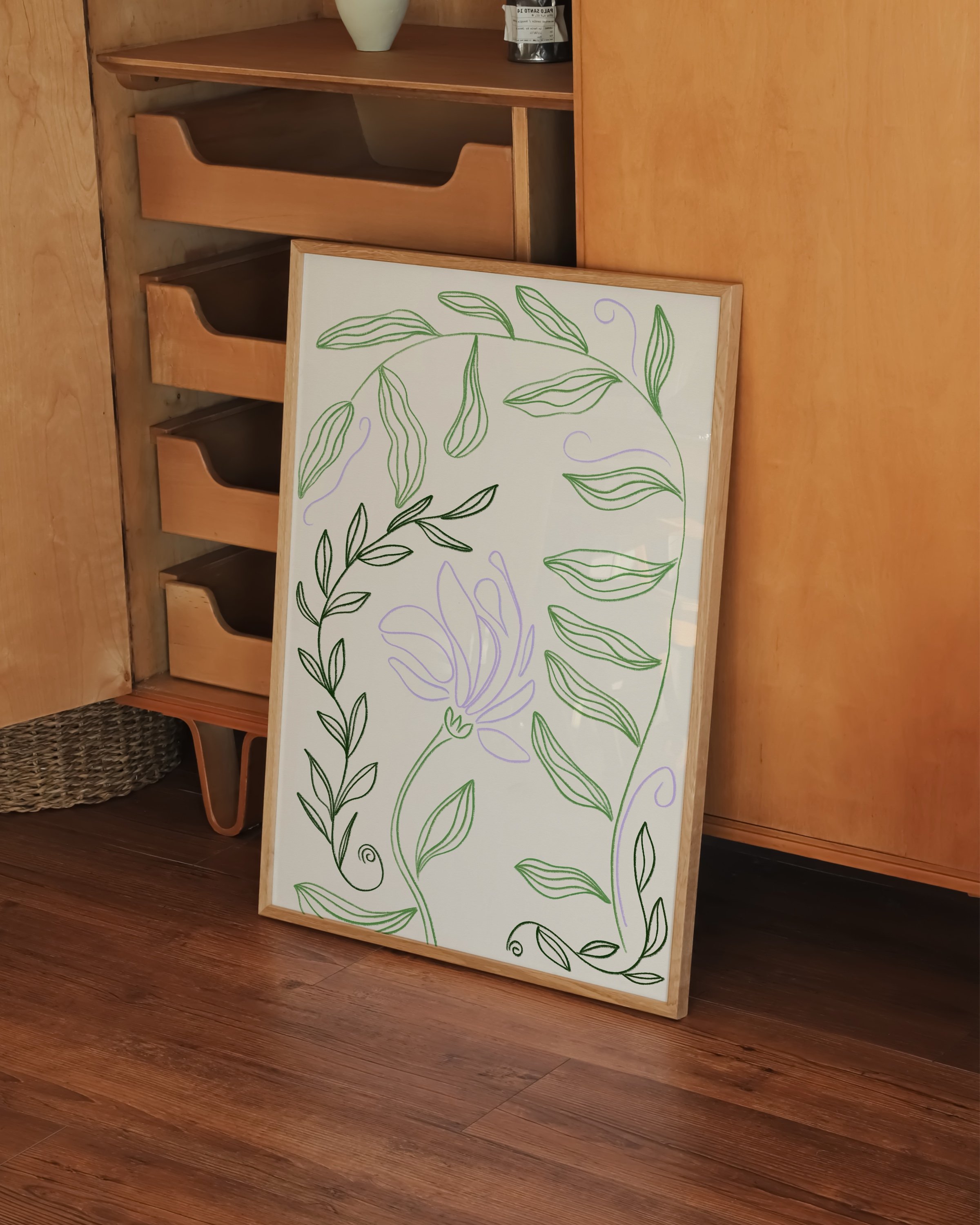 Minimalist botanical line drawing with green leafy vines and a delicate lilac flower on a beige background in a white frame.