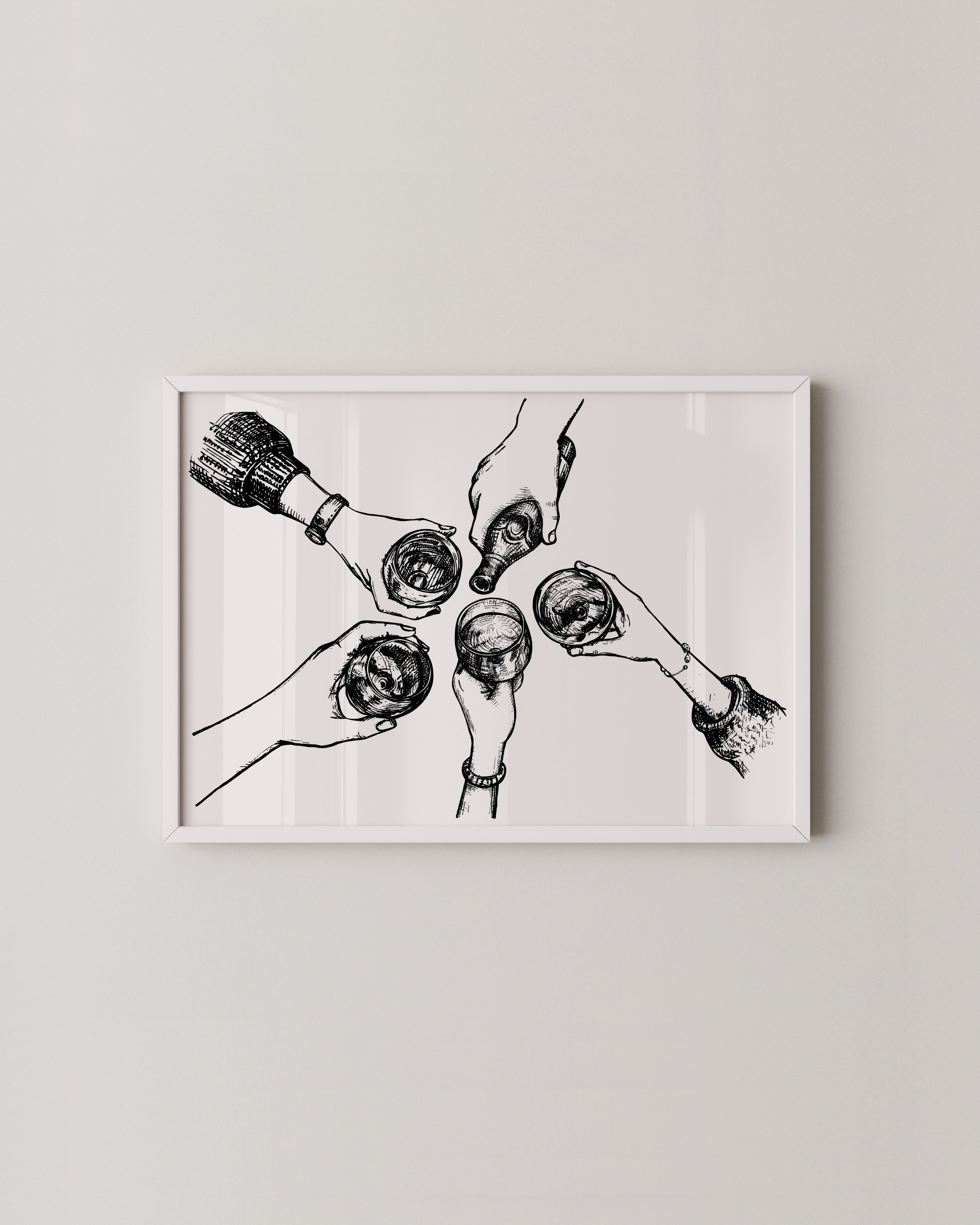 Minimalist black-and-white printable set featuring a ‘Cheers!!’ script and a hand-drawn toast scene, displayed in sleek white frames on a neutral wall.