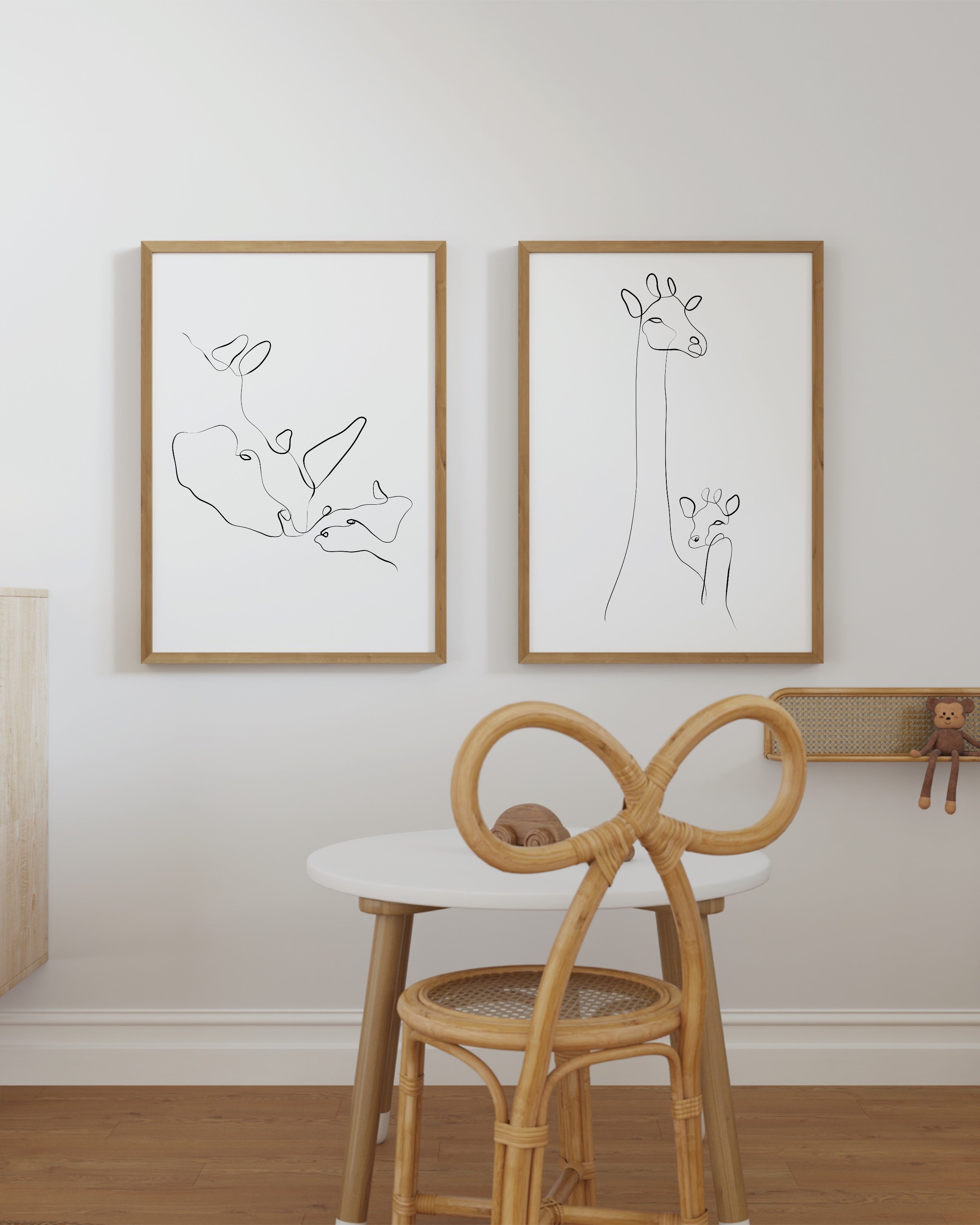 Minimalist line art of giraffe and rhino, designed for kids’ room decor, adding a touch of elegance and nature to the space.