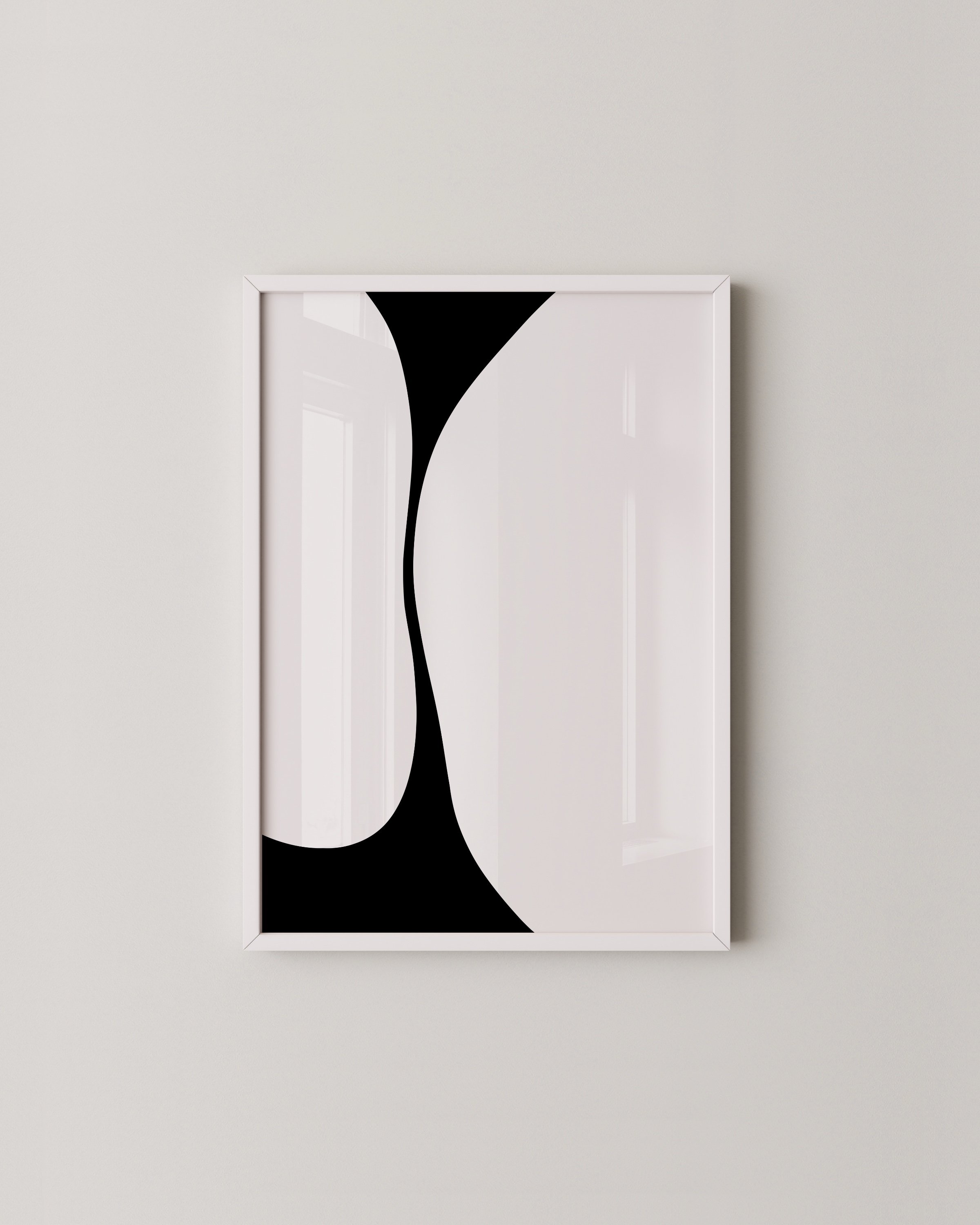 A set of three abstract black and white art prints featuring bold, minimalist shapes in a cohesive triptych design.