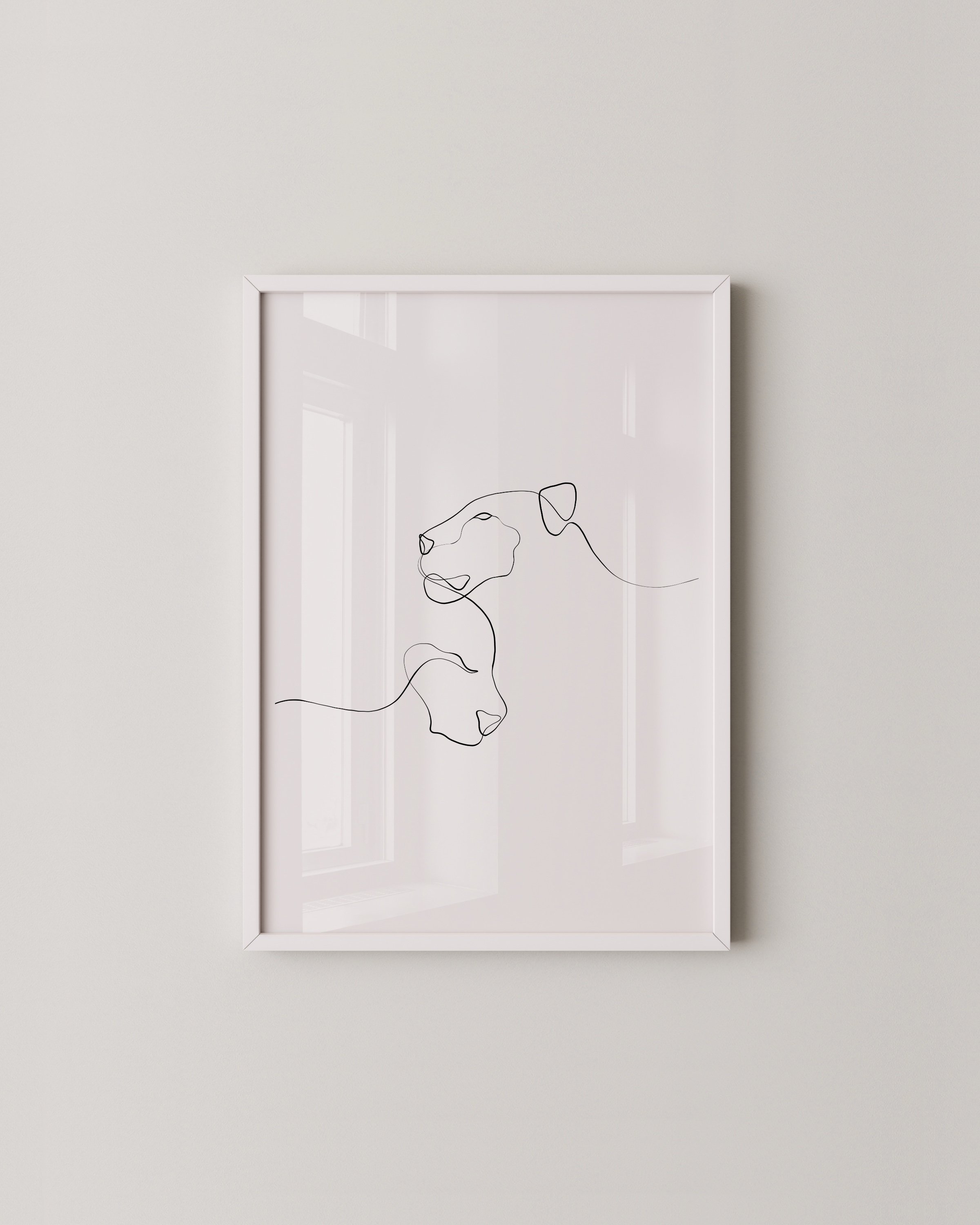 Minimalist line art illustration of a mother lioness and her cub, drawn with a single continuous line on a white background.