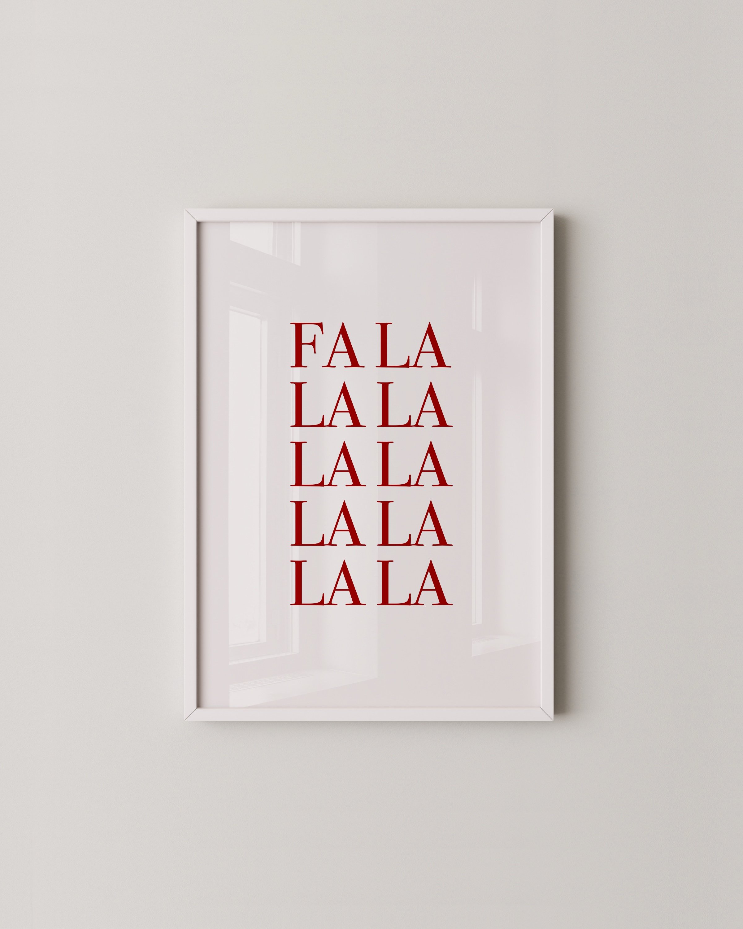 “Fa La La” in bold red typography stacked vertically on a white background, ideal for festive holiday decor.