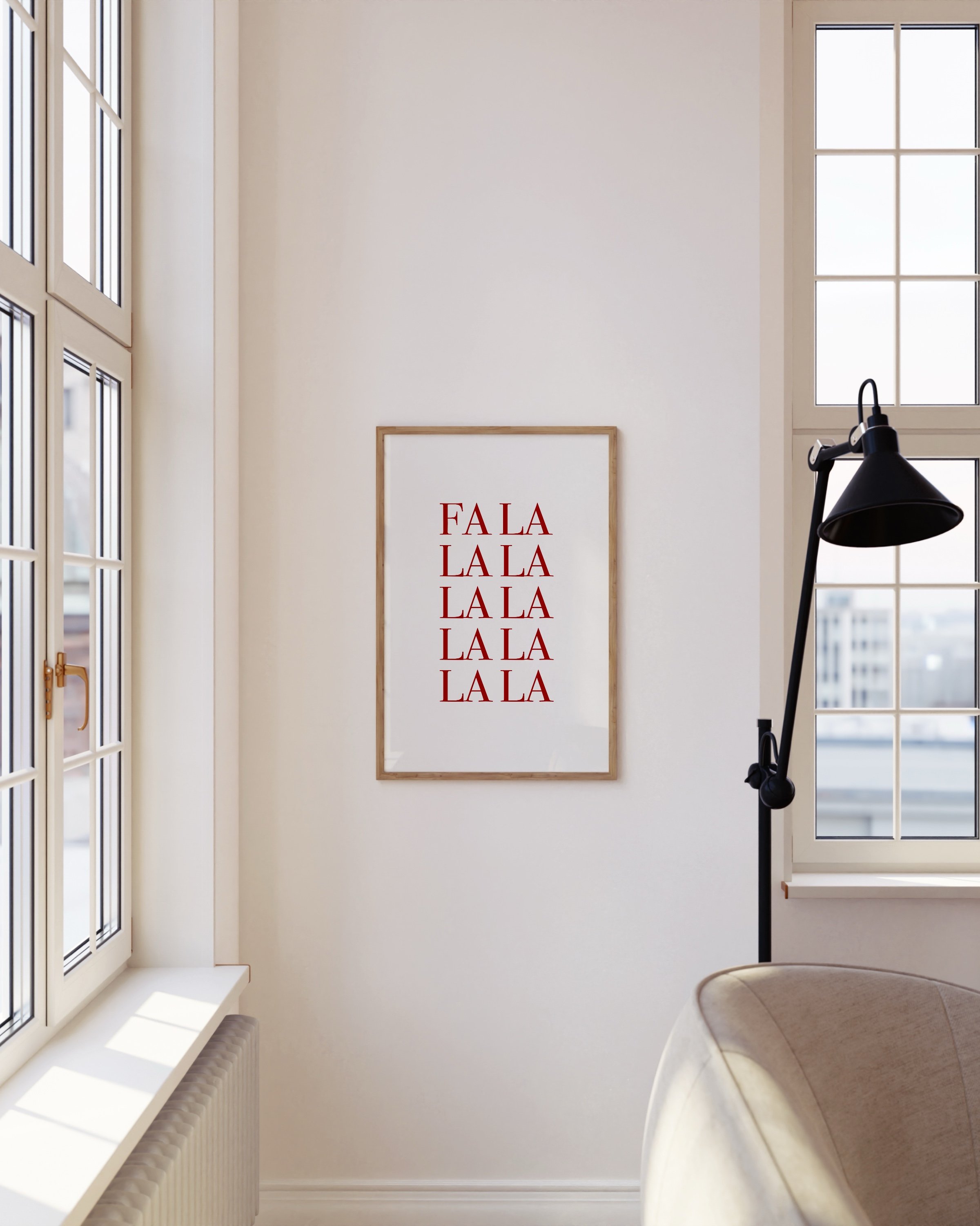 “Fa La La” in bold red typography stacked vertically on a white background, ideal for festive holiday decor.