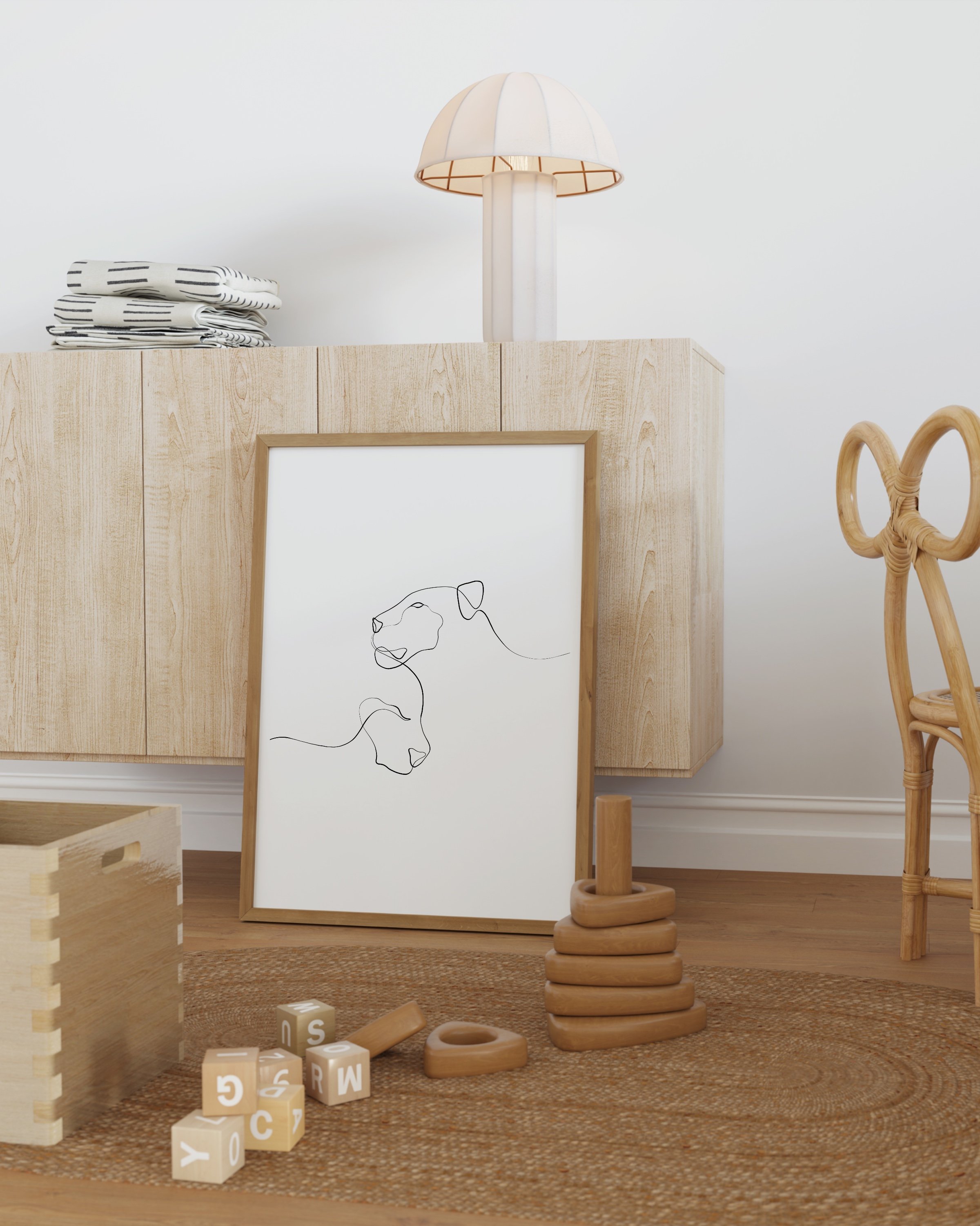 Minimalist line art illustration of a mother lioness and her cub, drawn with a single continuous line on a white background.