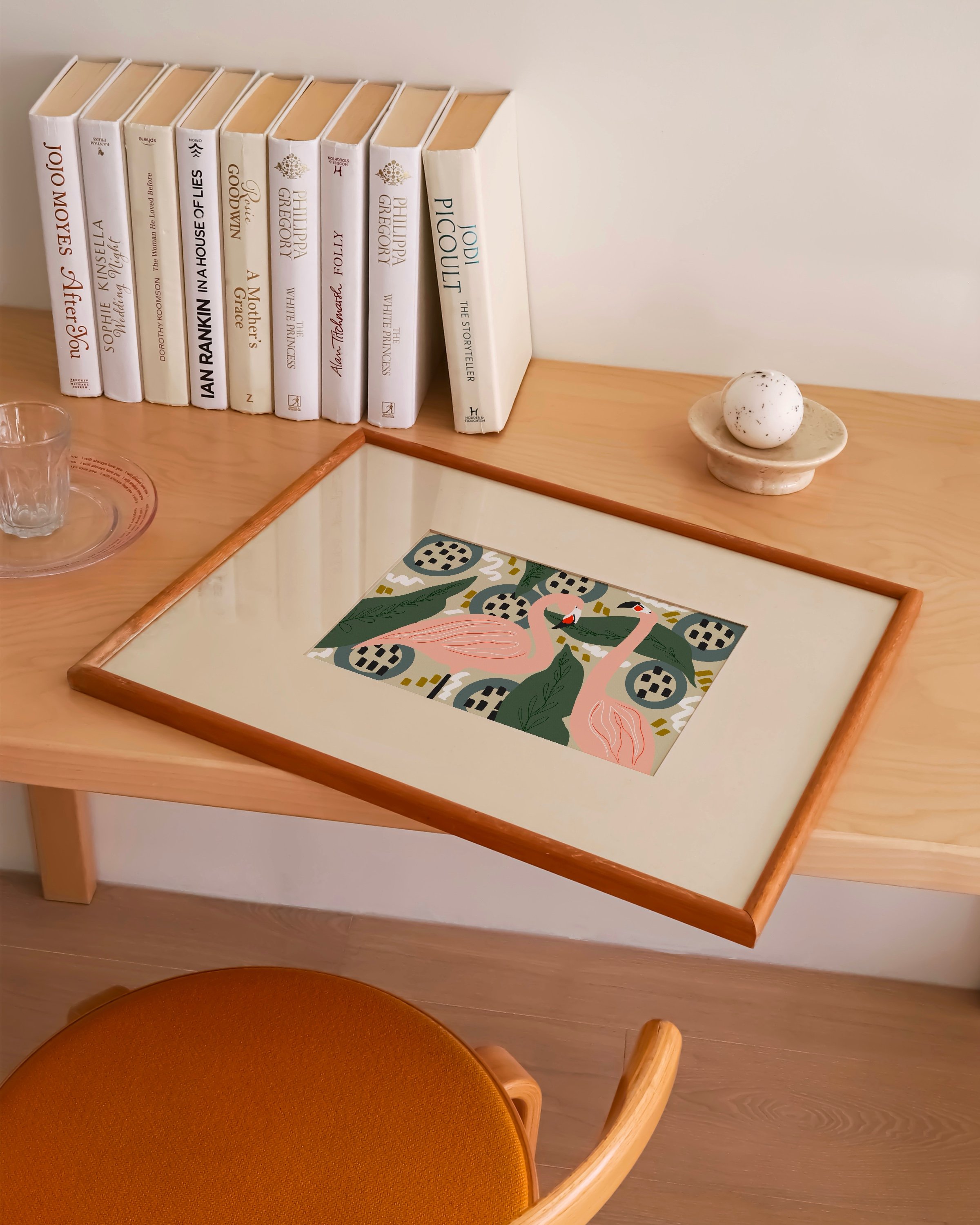 Playful flamingo art print featuring two pink flamingos surrounded by jungle foliage and abstract patterns in a vibrant, tropical palette.