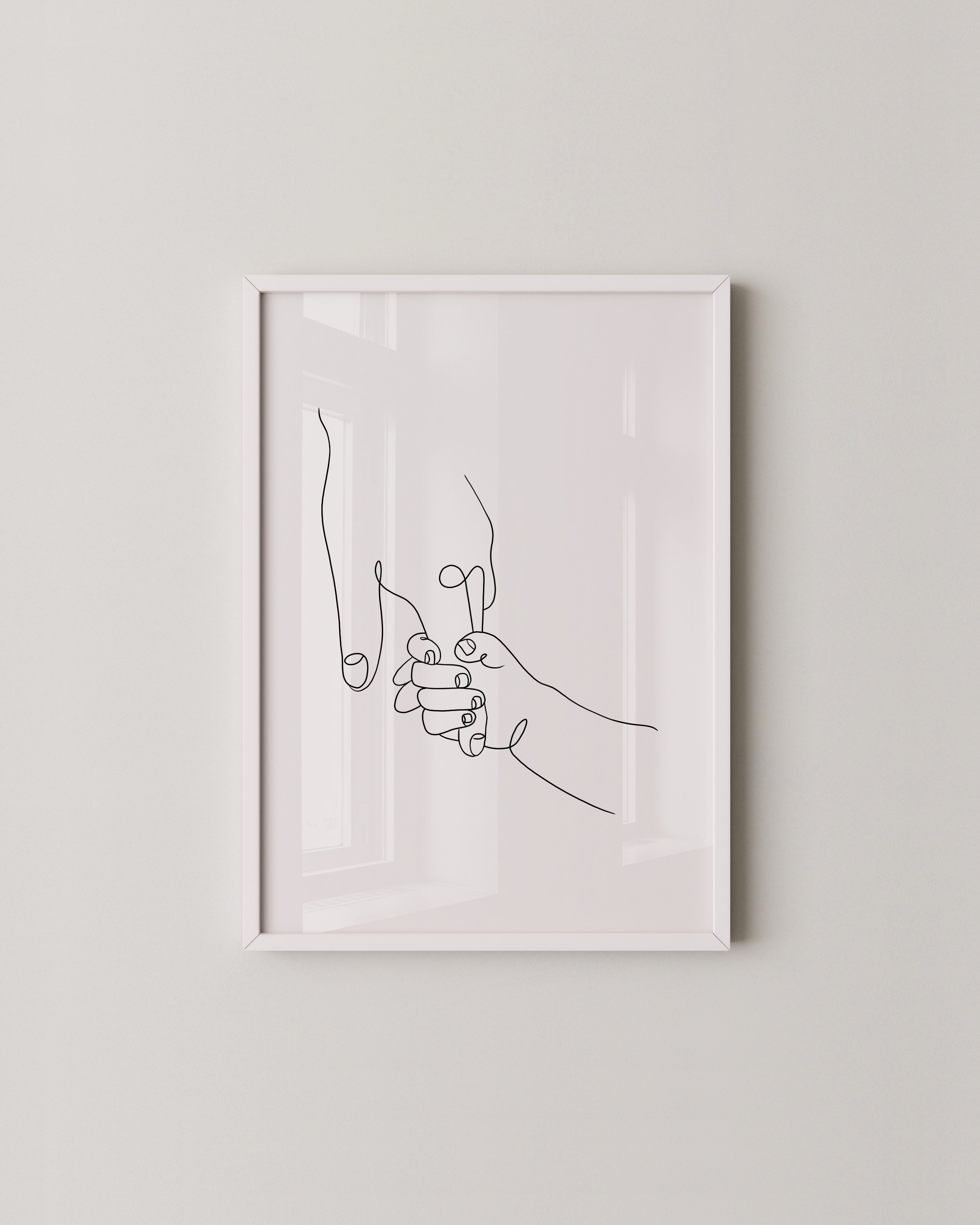 Minimalist line art of a child holding an adult’s finger, symbolizing family connection and love.