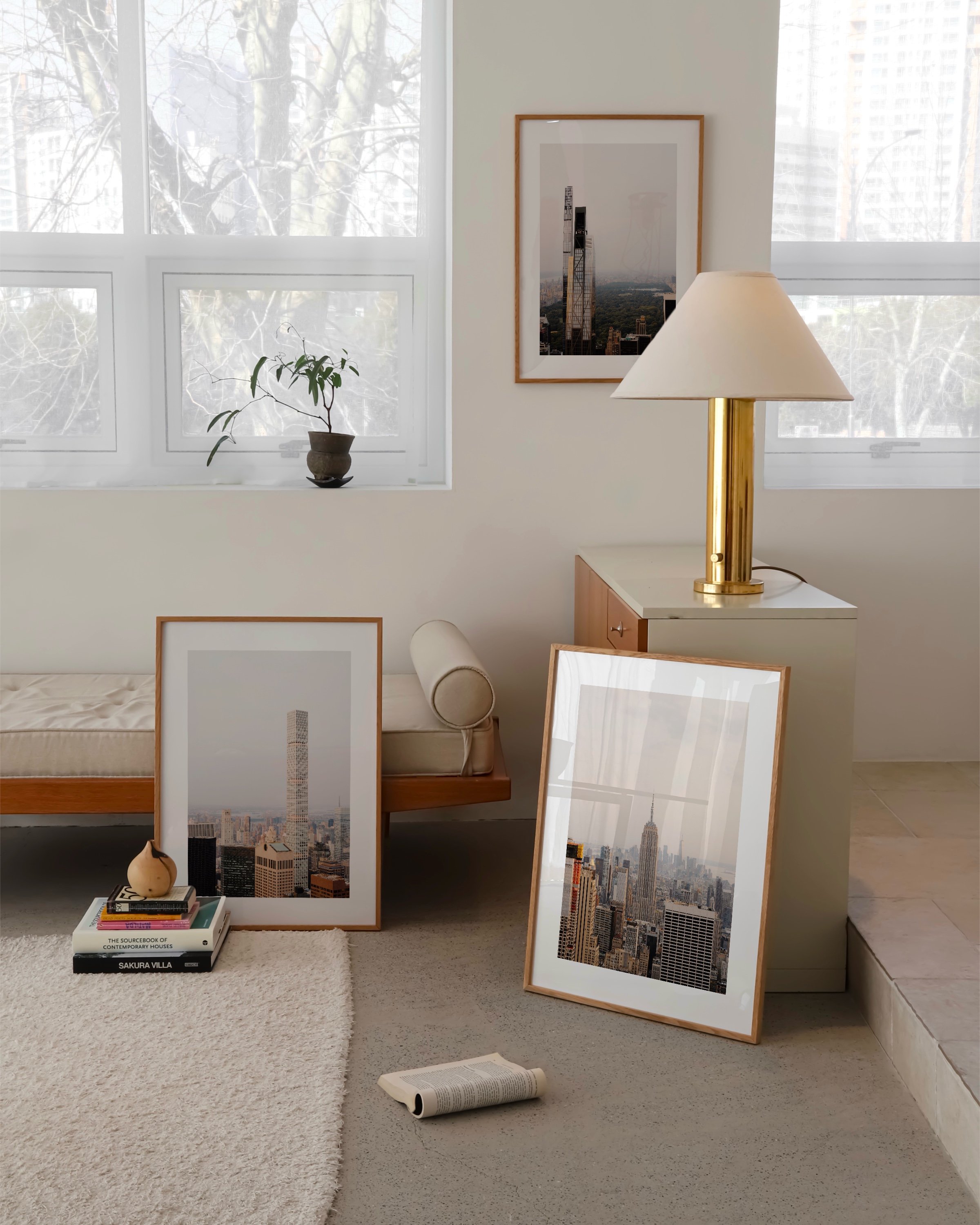 Set of three New York City skyline photography prints featuring iconic skyscrapers, including the Empire State Building and modern high-rises with views of Central Park.